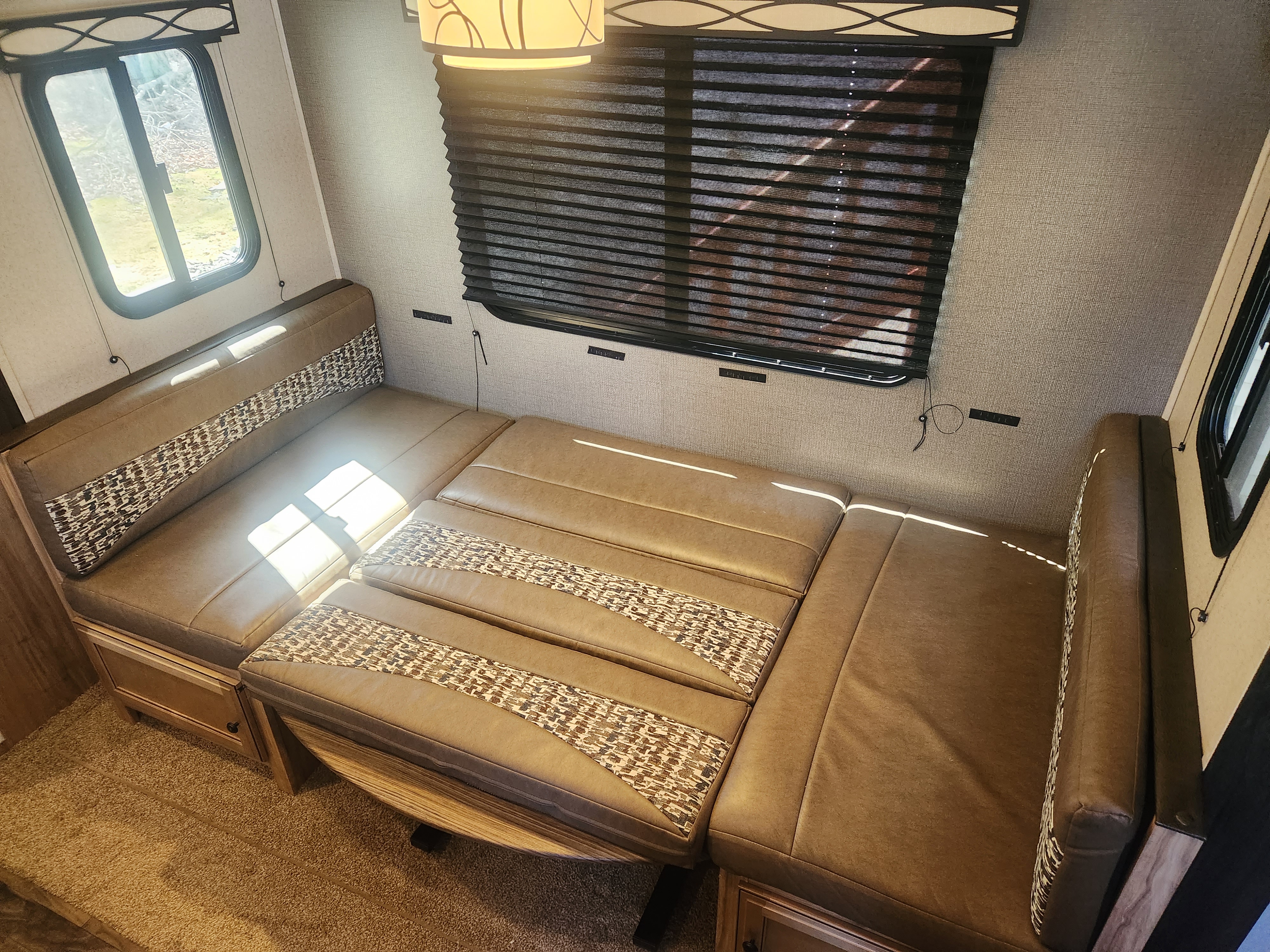 Dinette converts into full size bed. Coachmen Freedom Express ultra lite 2018