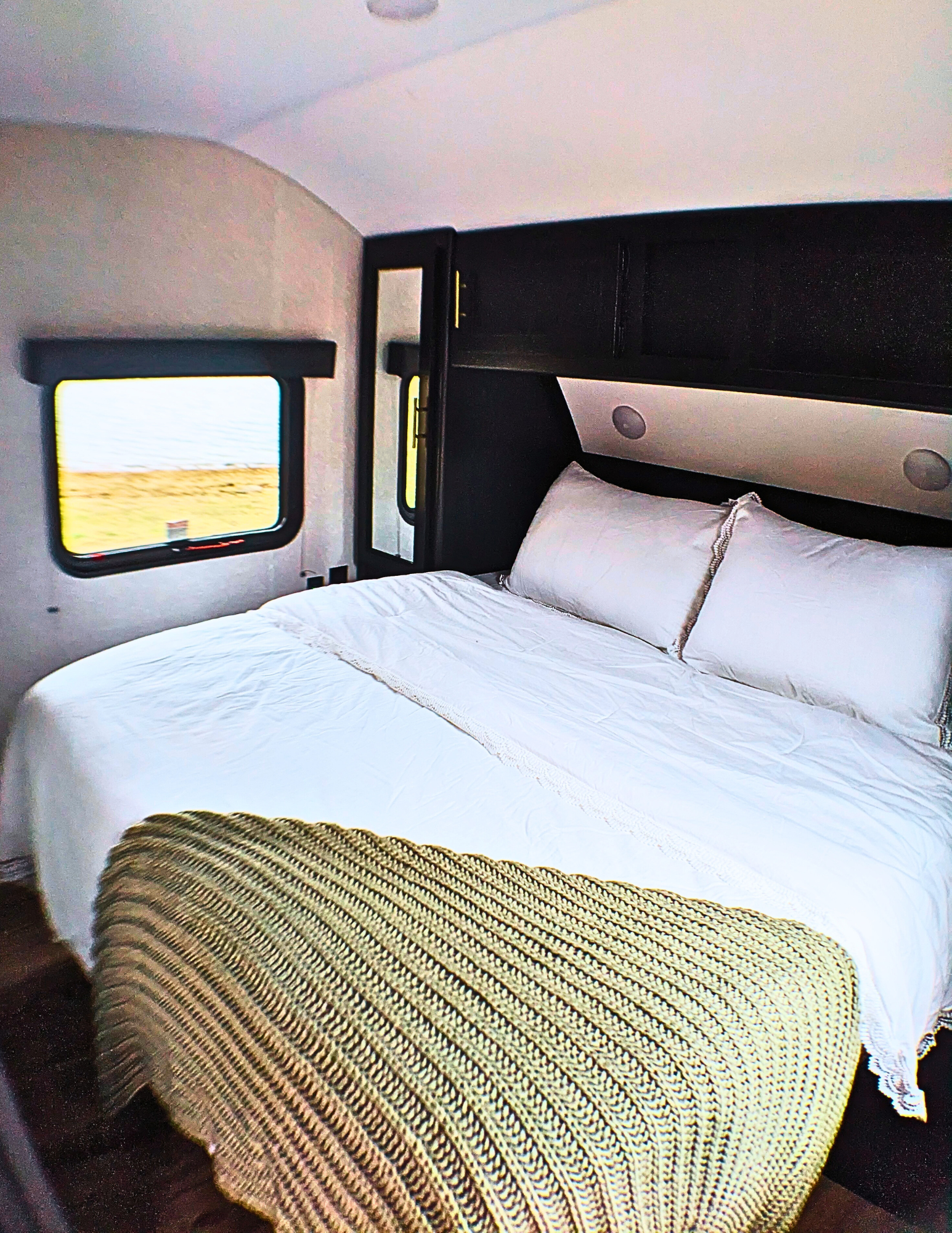 Queen size bed in dedicated master bedroom with dual closets plus a bonus linen closet.. Forest River Cherokee Grey Wolf 2022