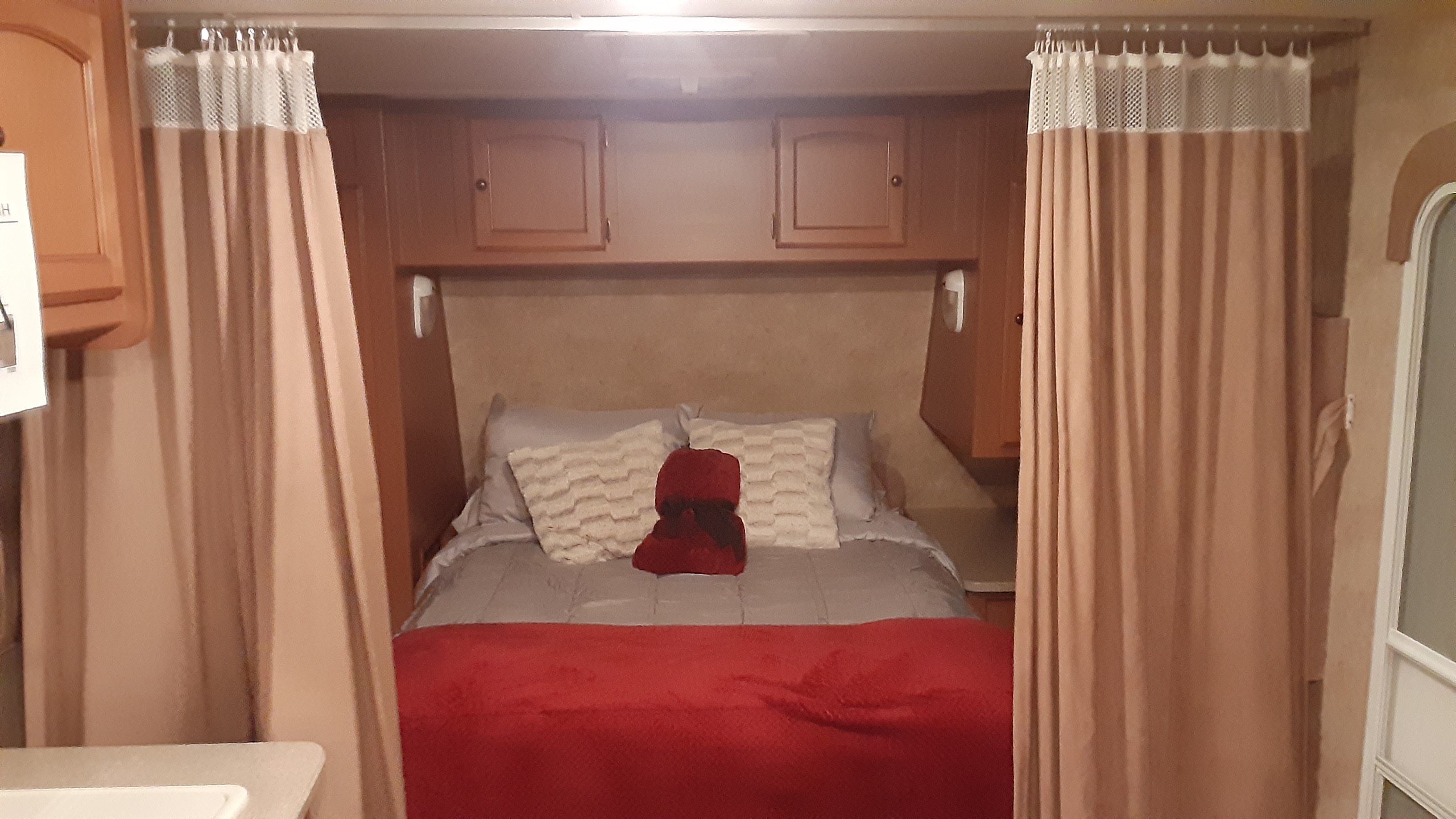 Queen bed with privacy curtains . Gulf Stream Gulf Breeze Sport 2011