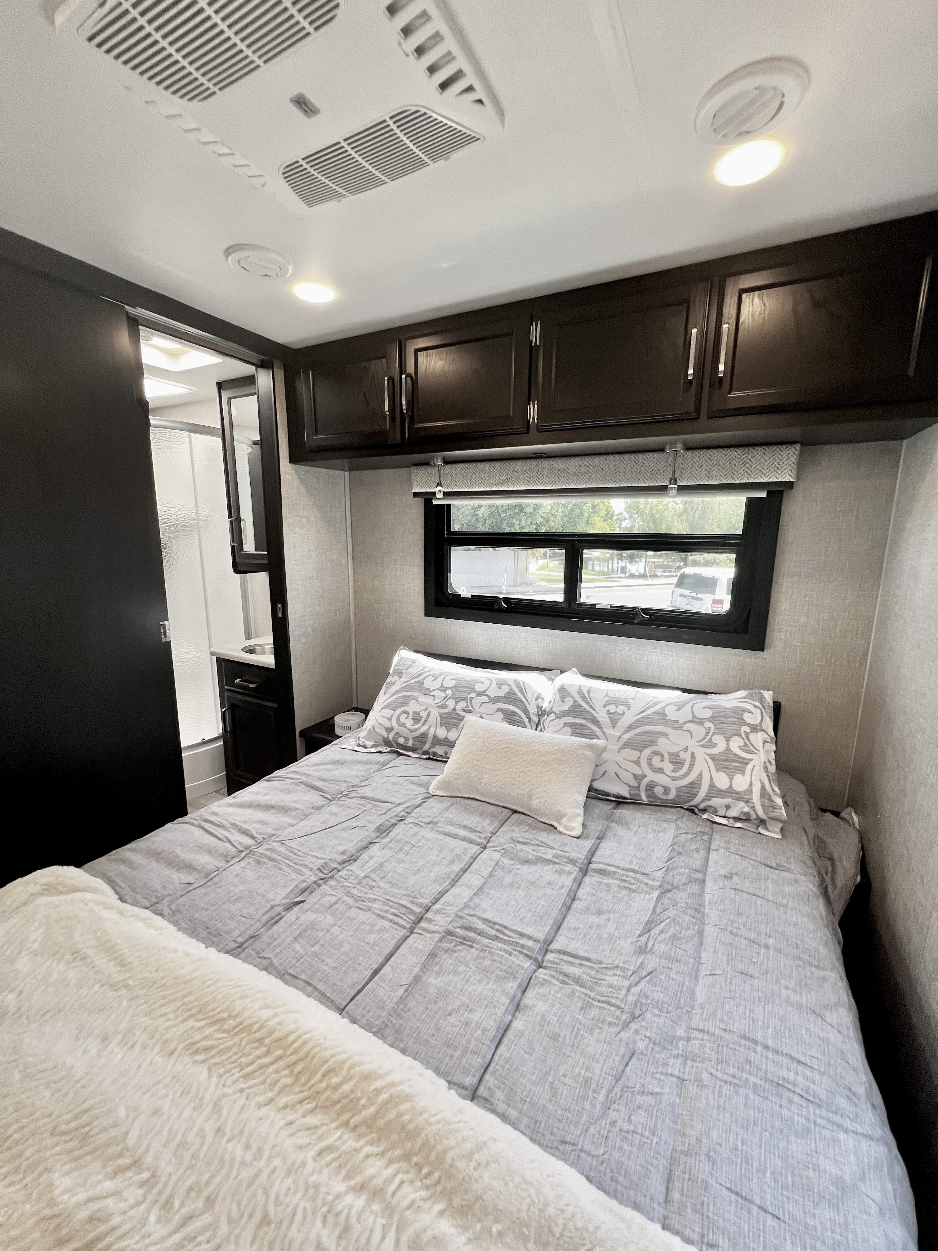 A nice queen bed made specifically with you in mind wanting a great nights sleep. Entegra Coach Vision 2023