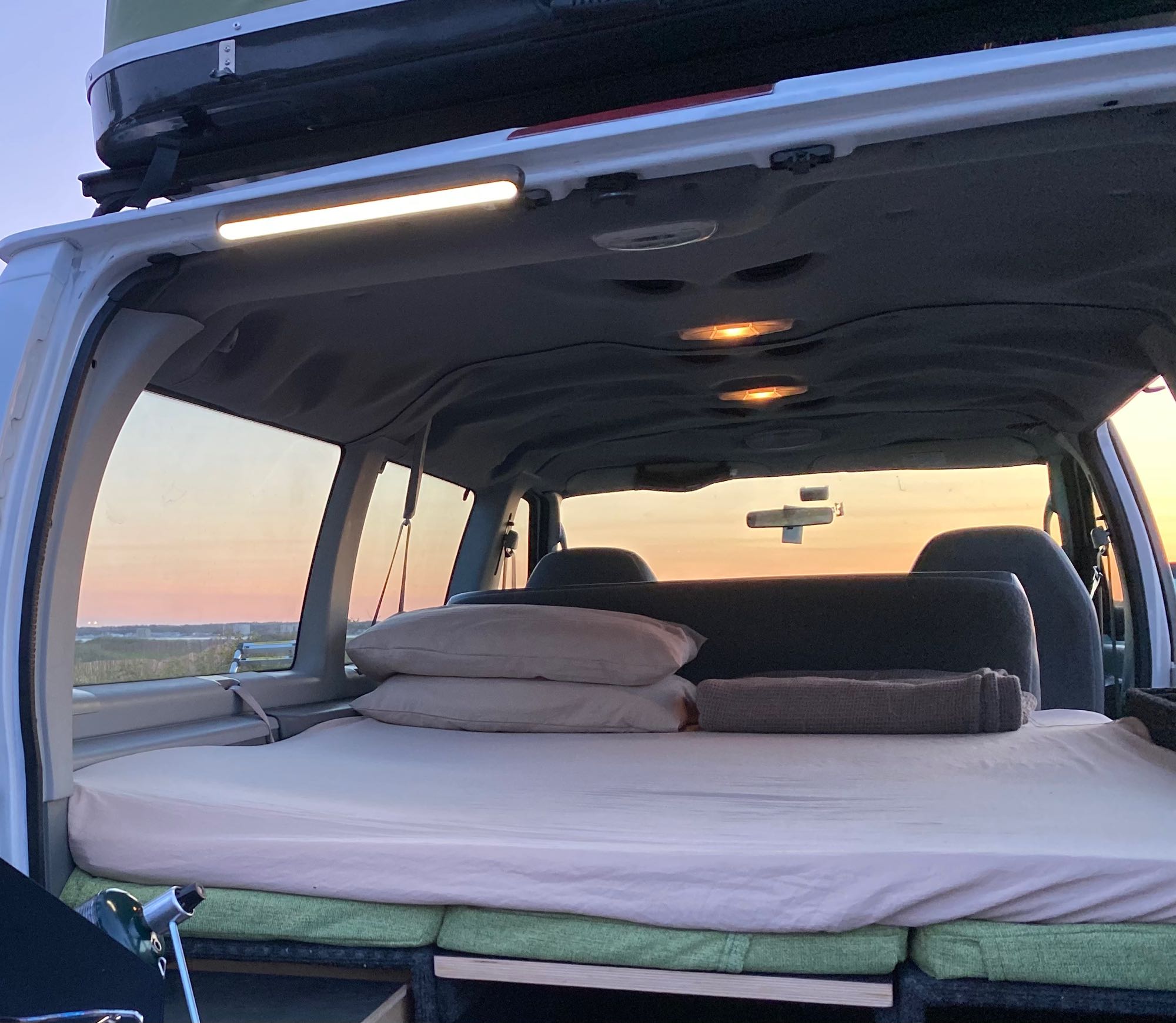 Queen size bed. We include window covers for full privacy and to block any light. . Ford Econoline 150 2006