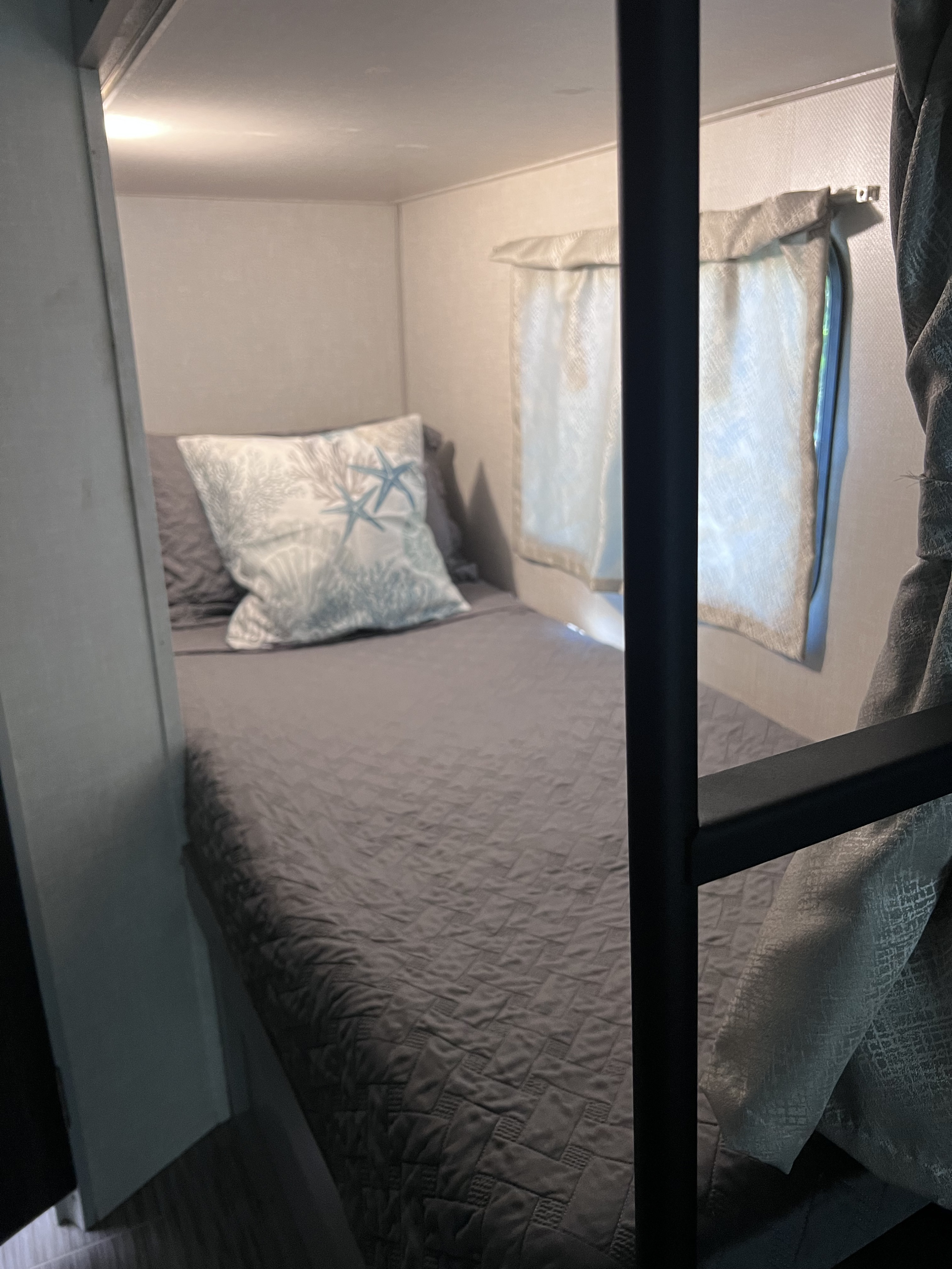 Bottom bunk, each with their own window, privacy curtain, USB charging, plugs and lighting.. Forest River Ibex 2021