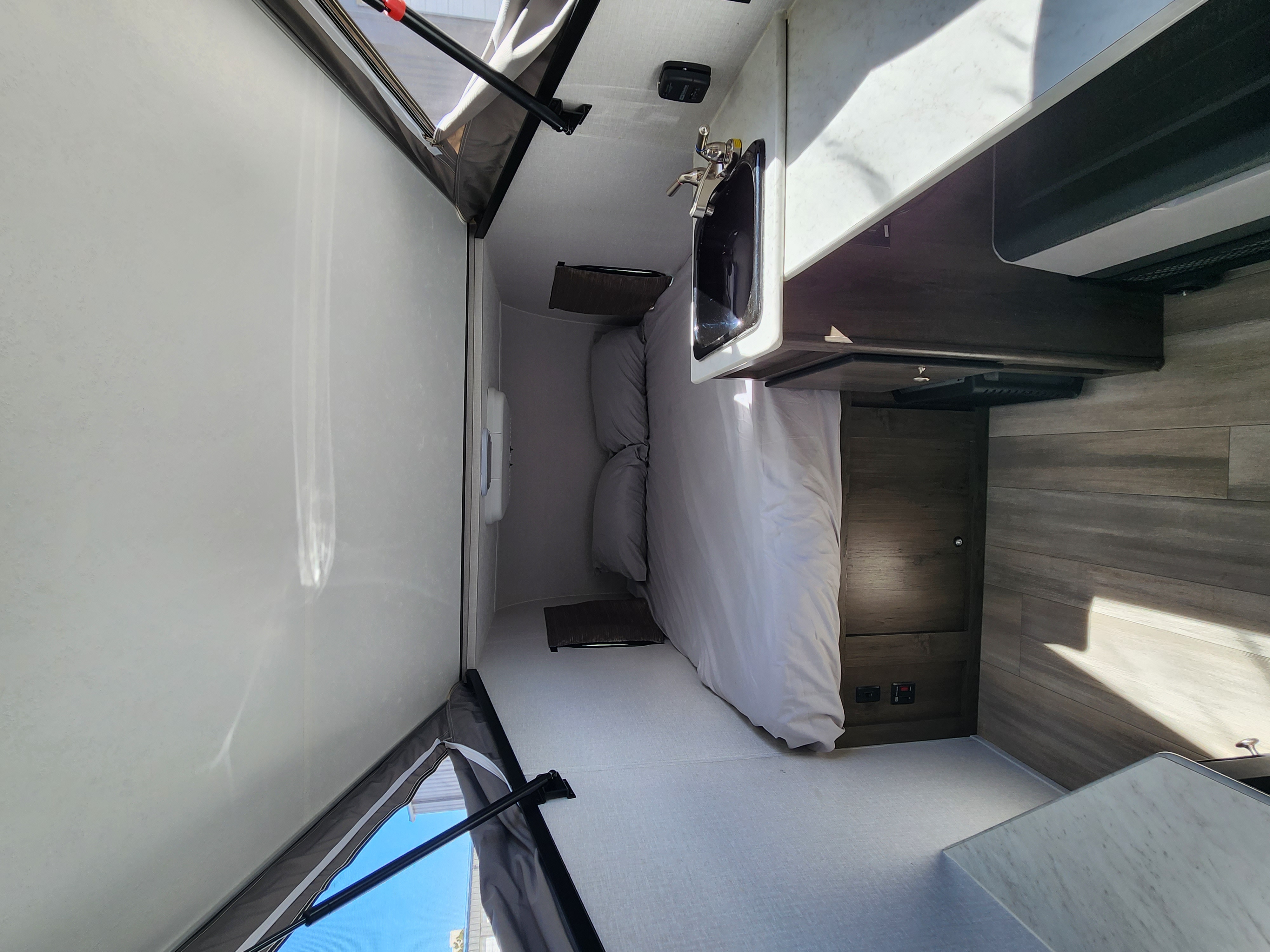 Full bed, sleeps two adults, with fridge cooler and sink.. Forest River Viking TD 2022