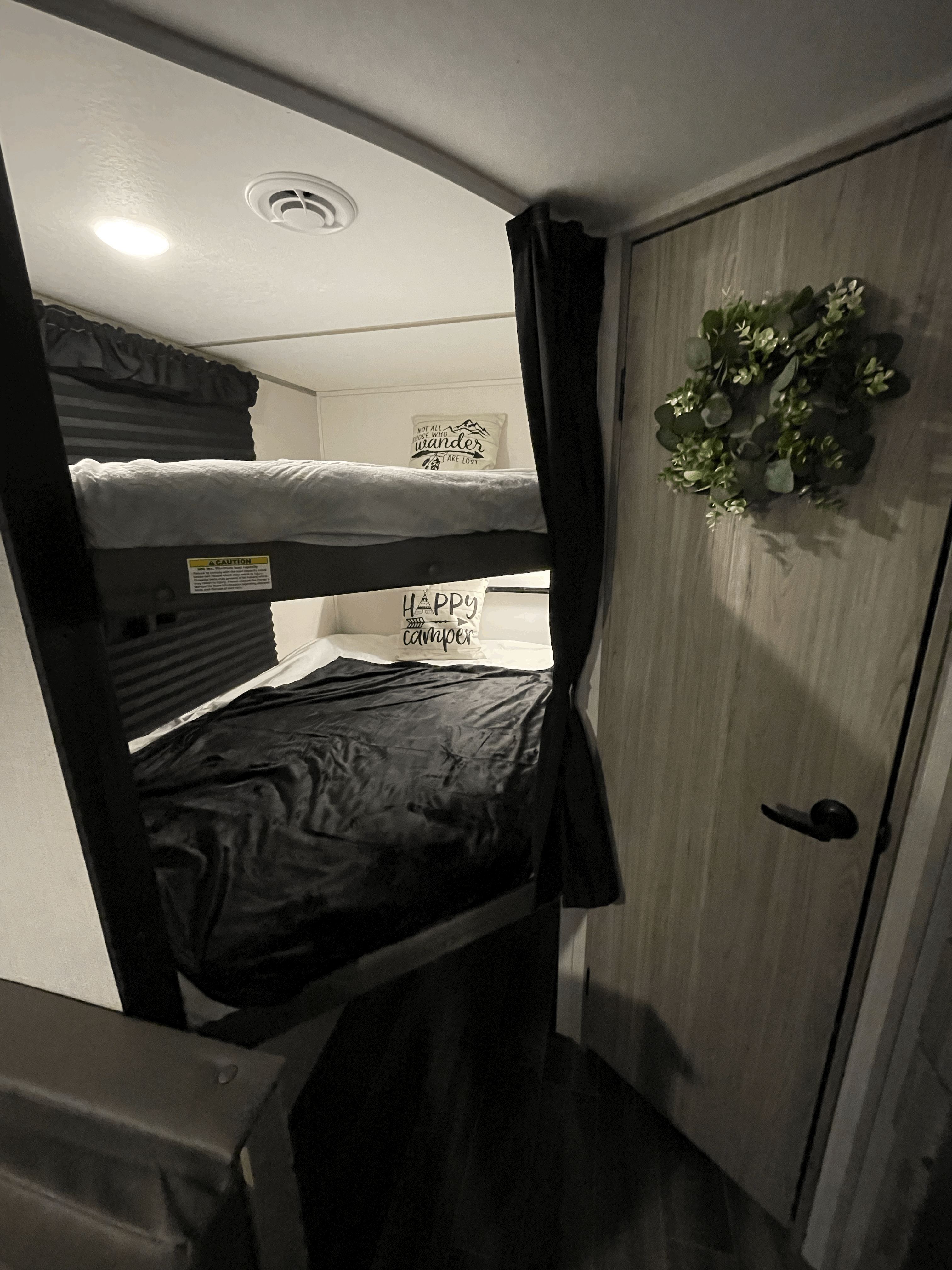 Full-size bunks in back. Keystone RV Passport SL 2022