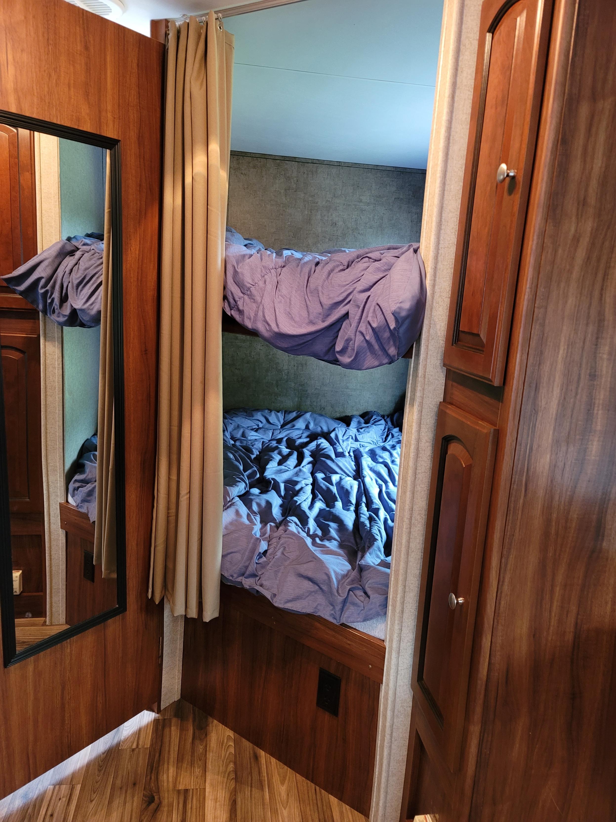 2 Full size bunks includes linens and windows for quick escape and fresh air.. Heartland RVs North Trail 2014