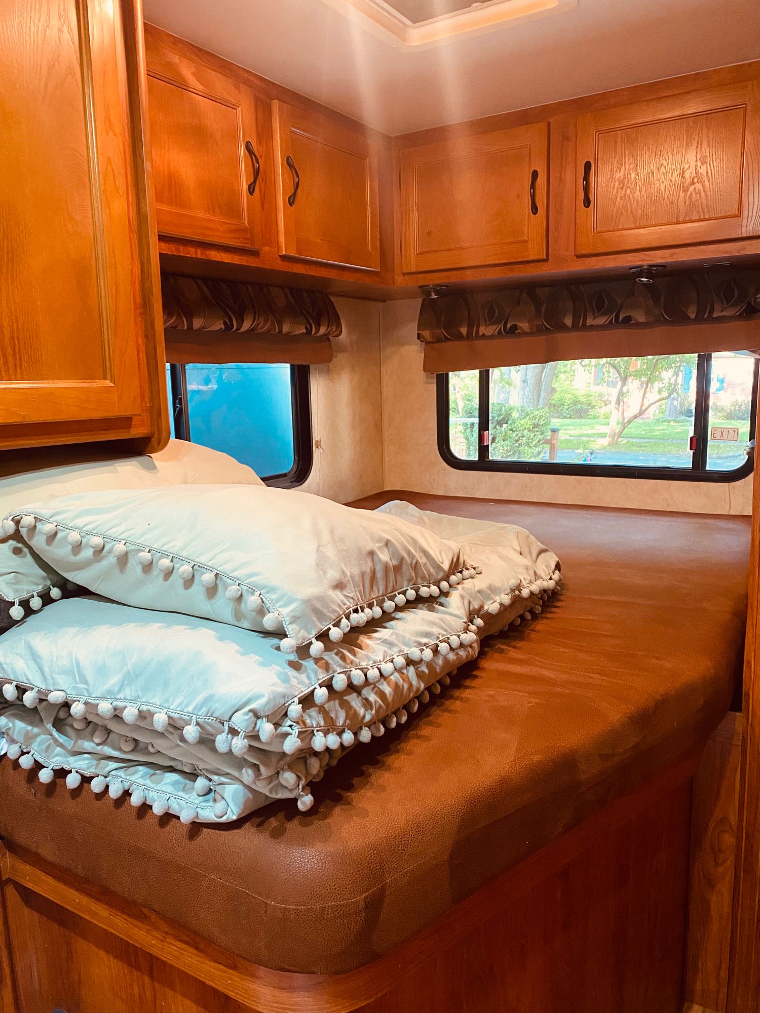 Lots of light and views from the queen bed. . Coachman Freelander 2012