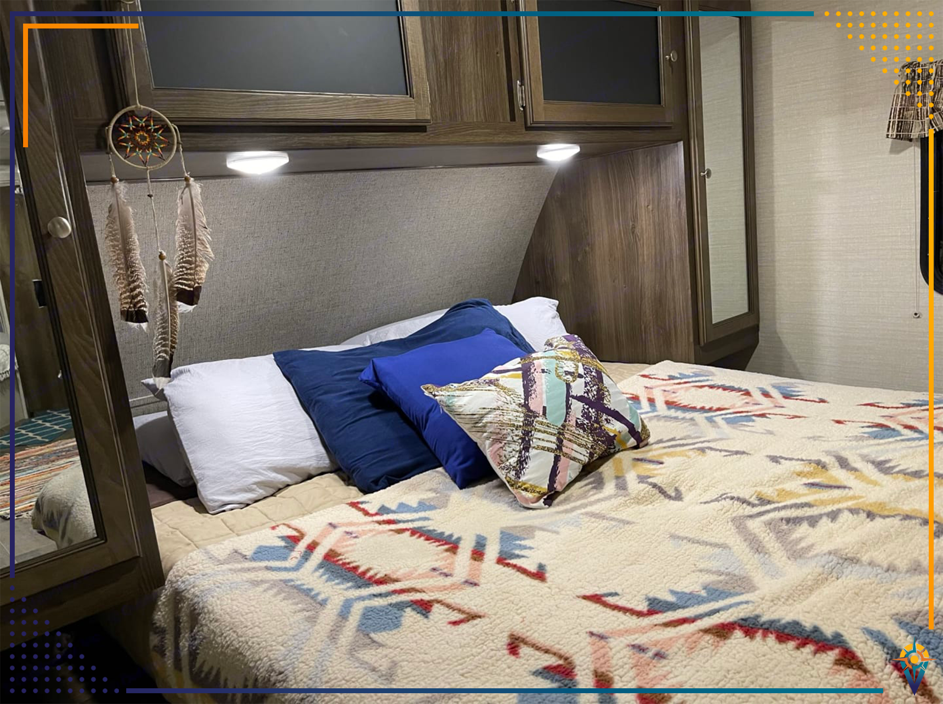 Cozy RV rental bedroom with a comfy bed, modern cabinets, and Native-inspired decor. Ready for adventure!. Keystone Bullet 2018