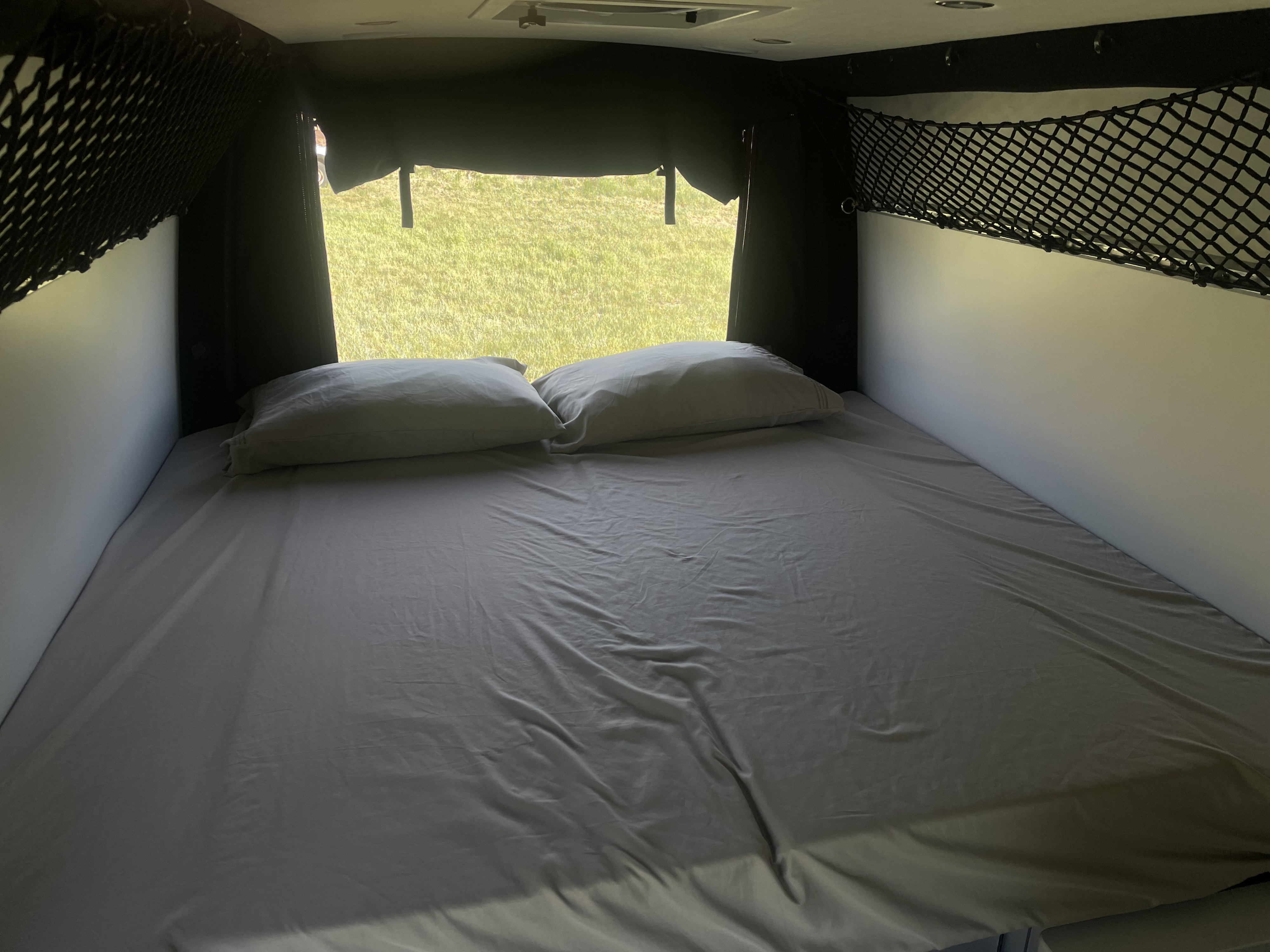 Fold down bed area, sheets and 2pillows included.. Pleasure Way RECON 2022