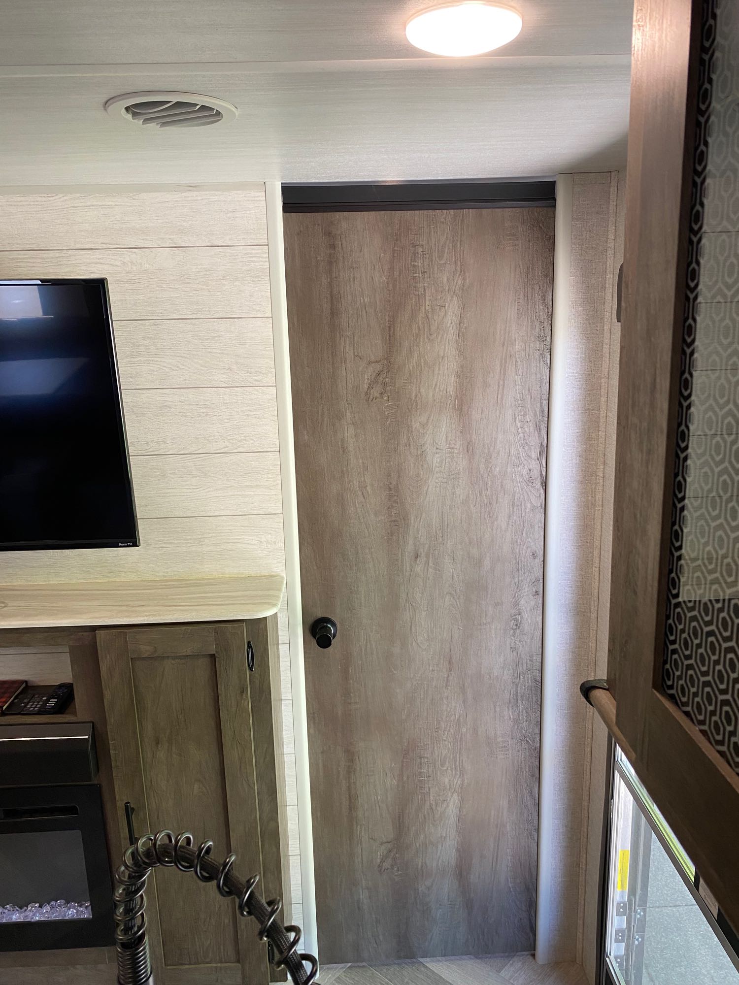 Doorway to primary bedroom. . Forest River Wildwood 2021