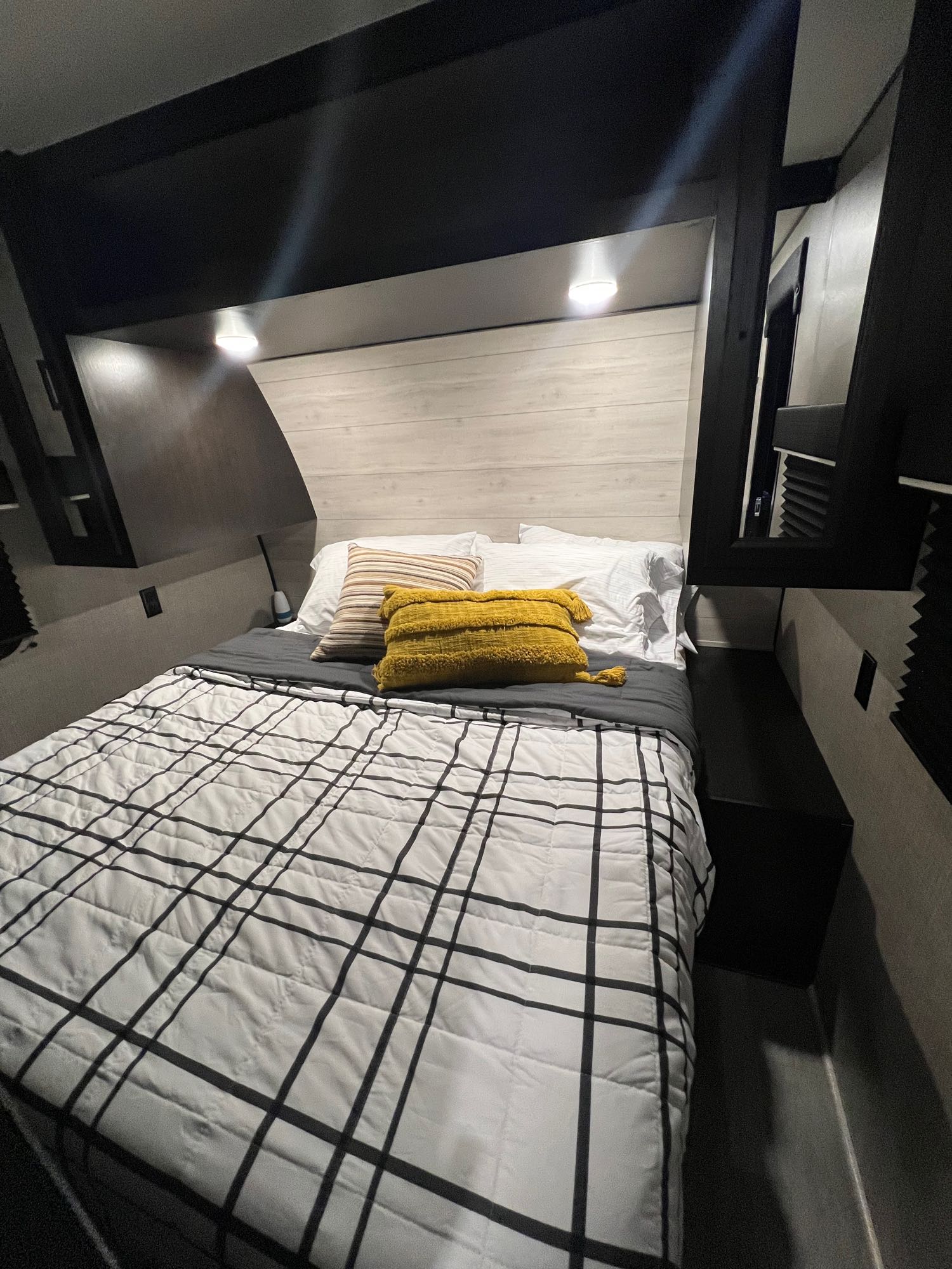 Cozy RV rental bedroom featuring a comfortable bed with modern decor, perfect for travel adventures.. Jayco Jay Flight 267BH 2023