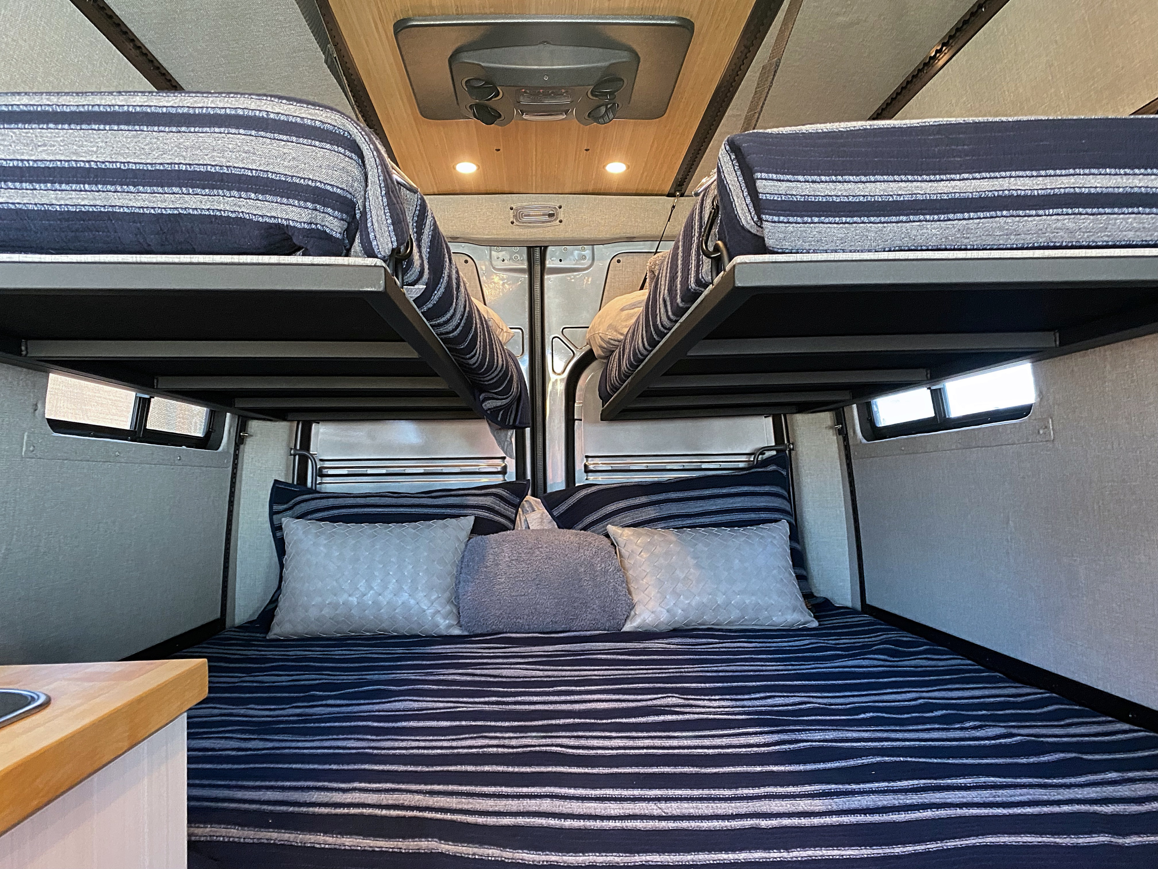 Sleeps 4, one queen Sized mattress, and two folding bunk beds. . Mercedes-Benz Sprinter 2023