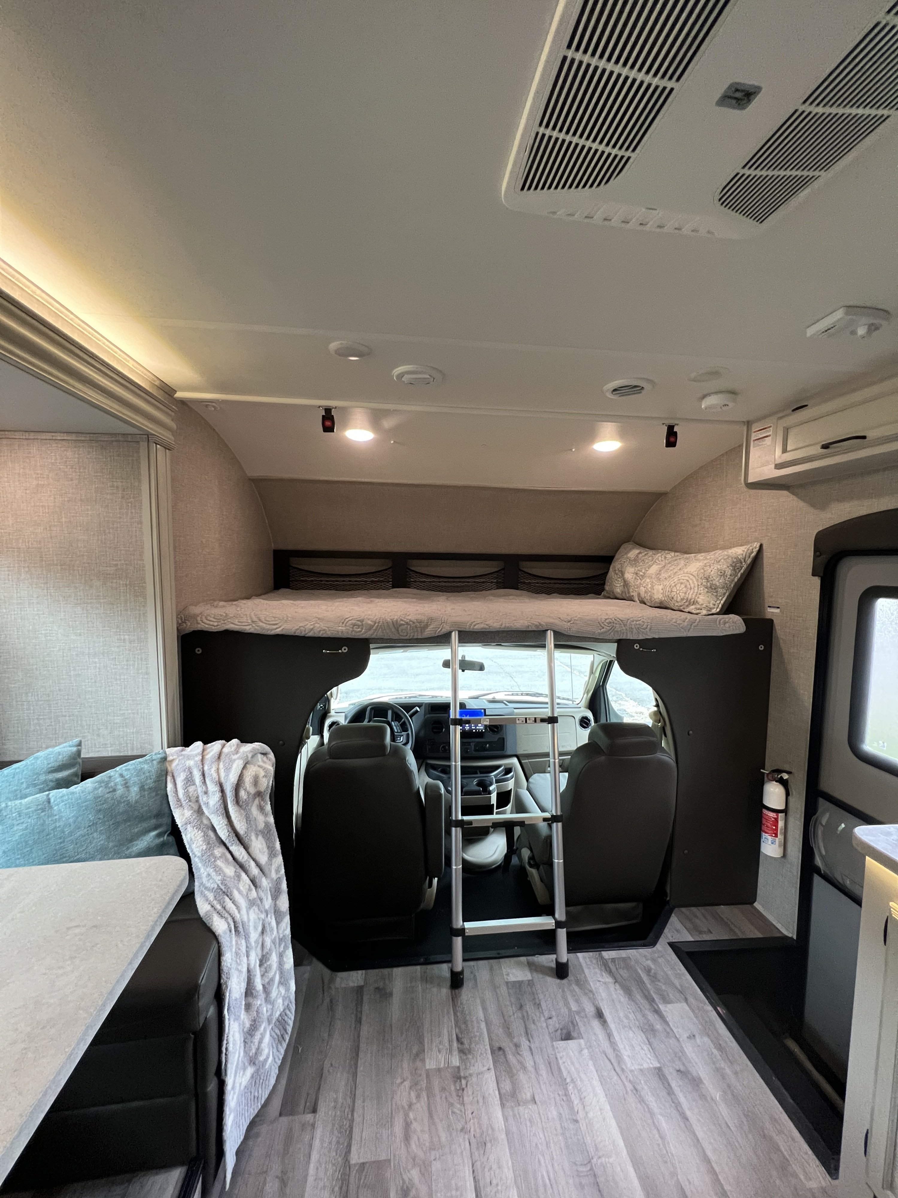 Over the cab is a queen size bed with a weight capacity of 750 lbs. . Jayco Redhawk 2023