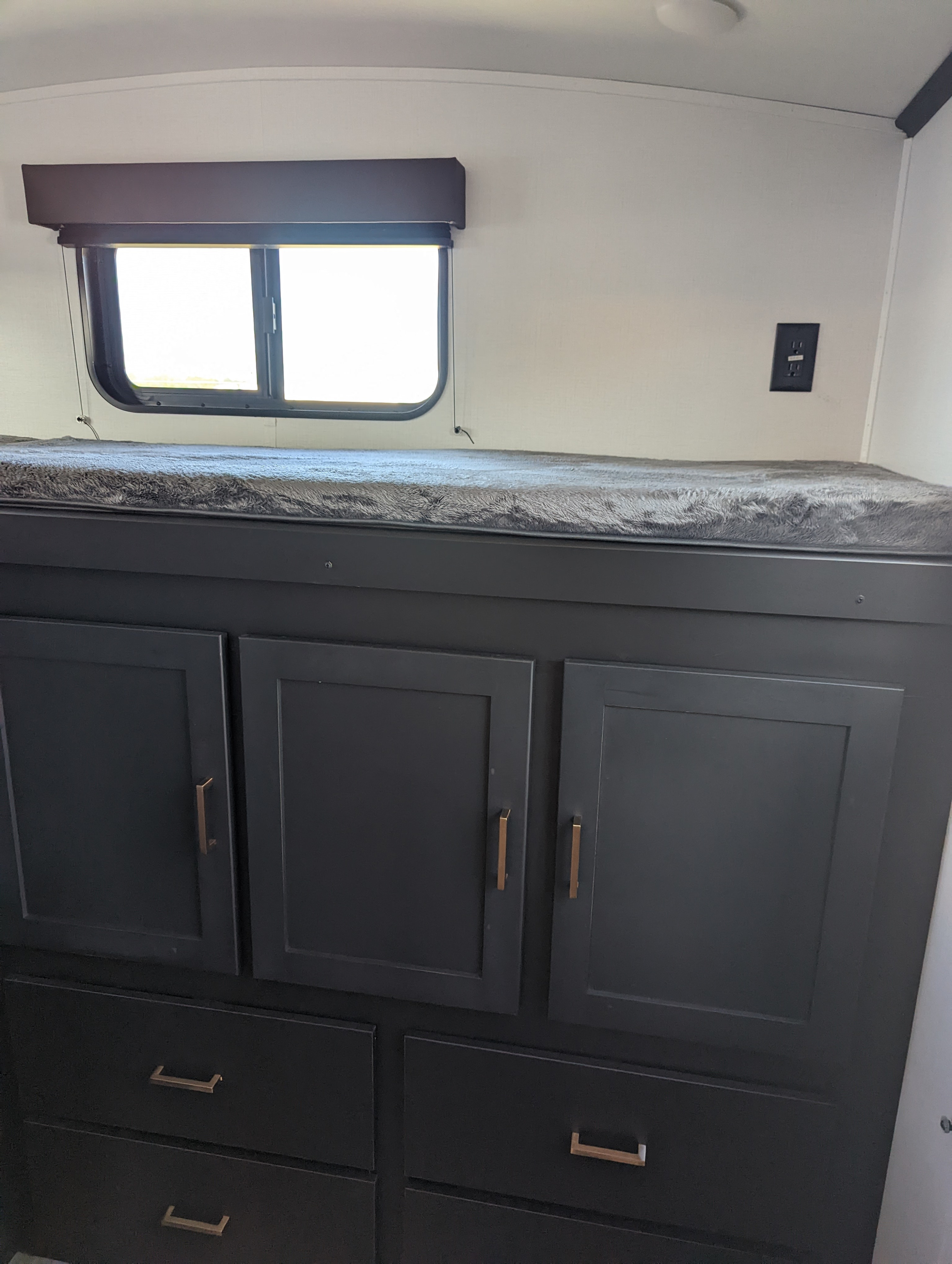 Third bunk in bunkhouse and bunkhouse storage/dresser.. Keystone RV Outback Ultra-Lite 2022