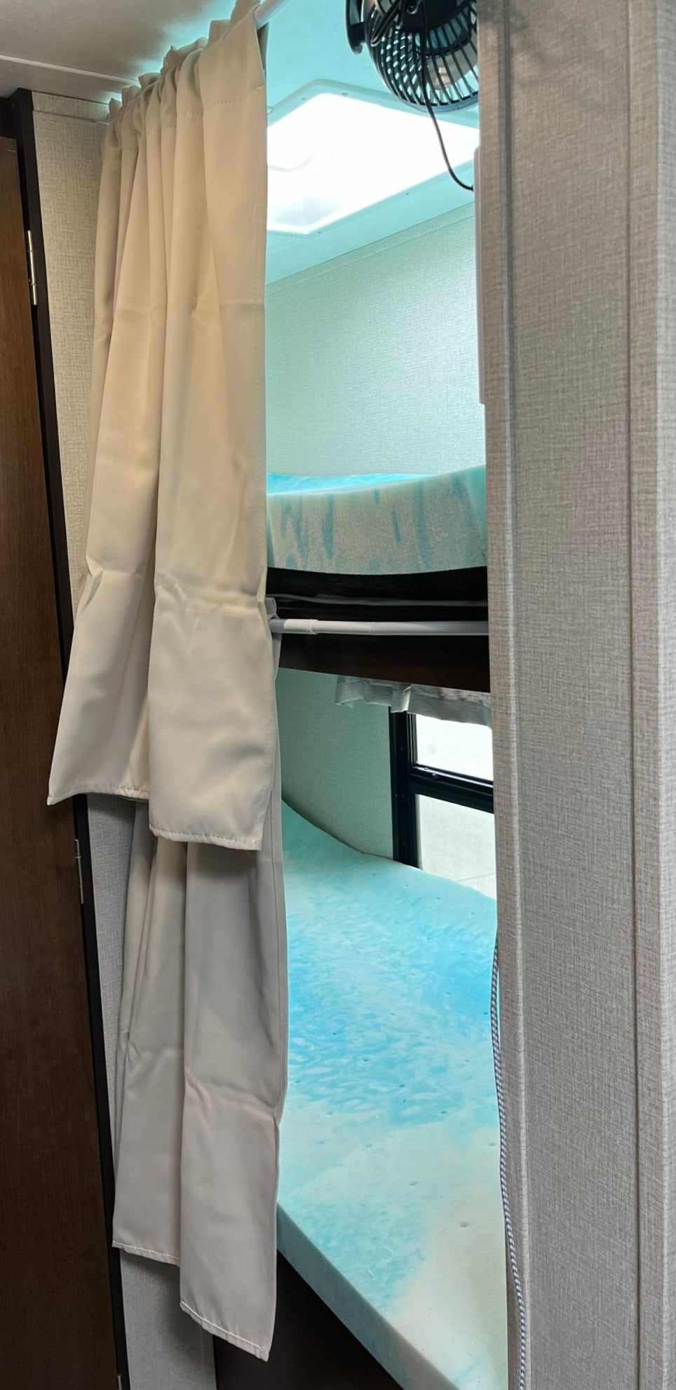 Twin bunks with privacy curtains, six inch mattresses and fans for air circulation.. PTX PTX Trailer 2019