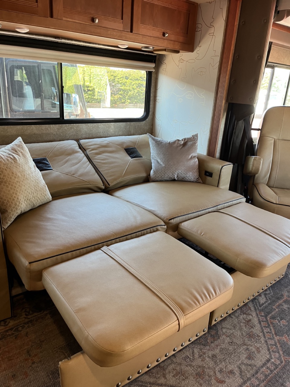 The sofa reclines to a queen size bed.. Winnebago Sightseer 2017