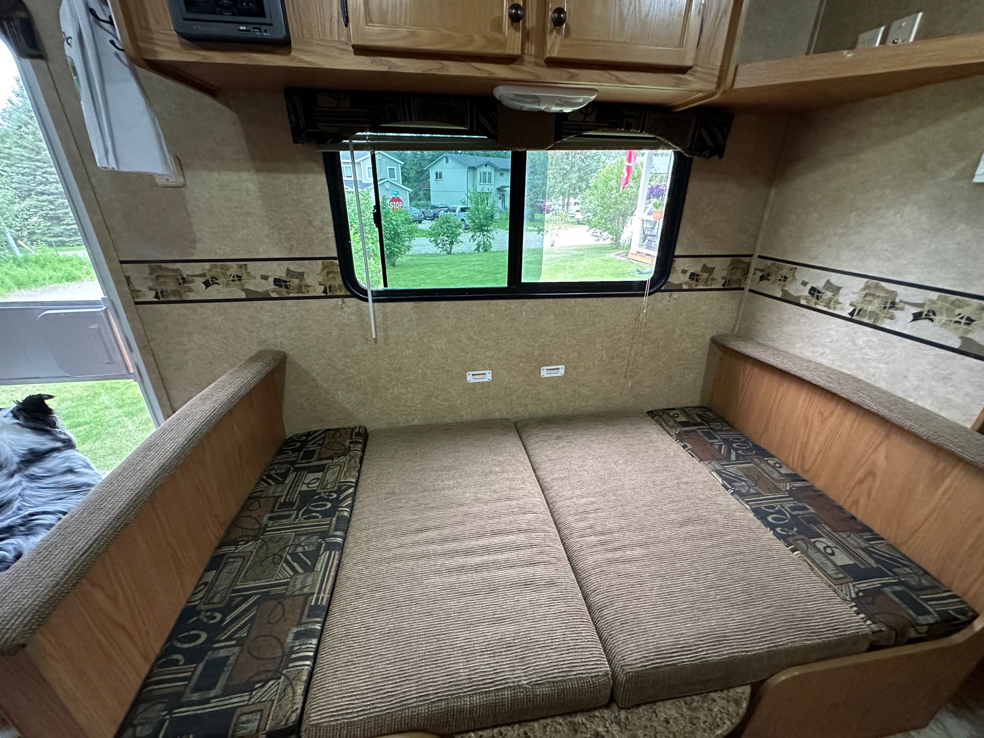 Dinette folded down to sleep . Heartland RVs Trail Runner 2011