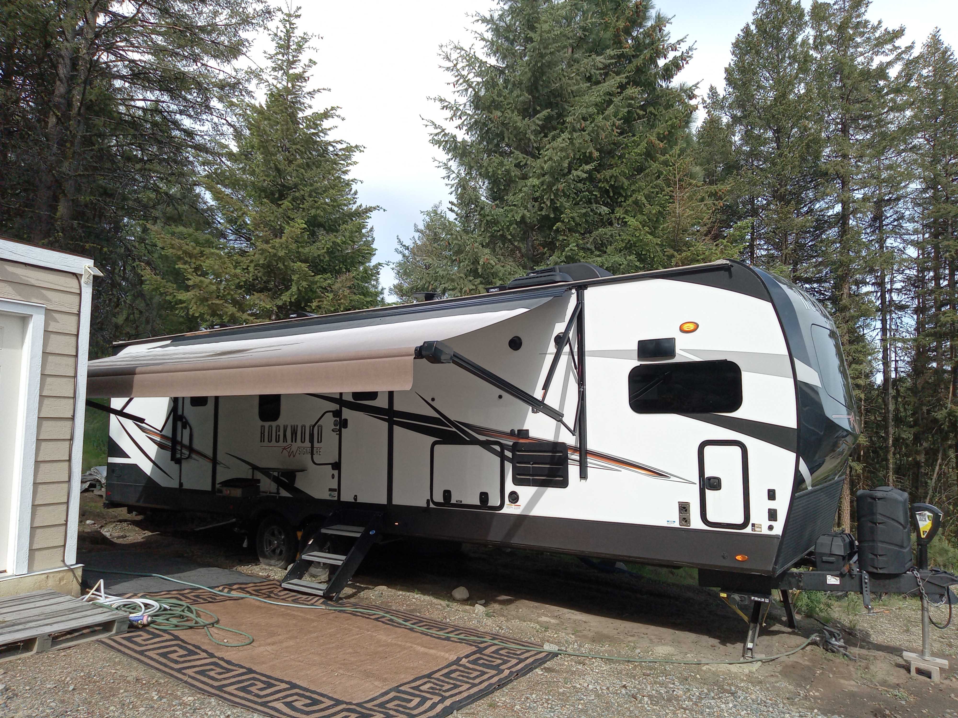 Gordon's 2021 Forest River Rockwood Signature top of line unit, king bed,