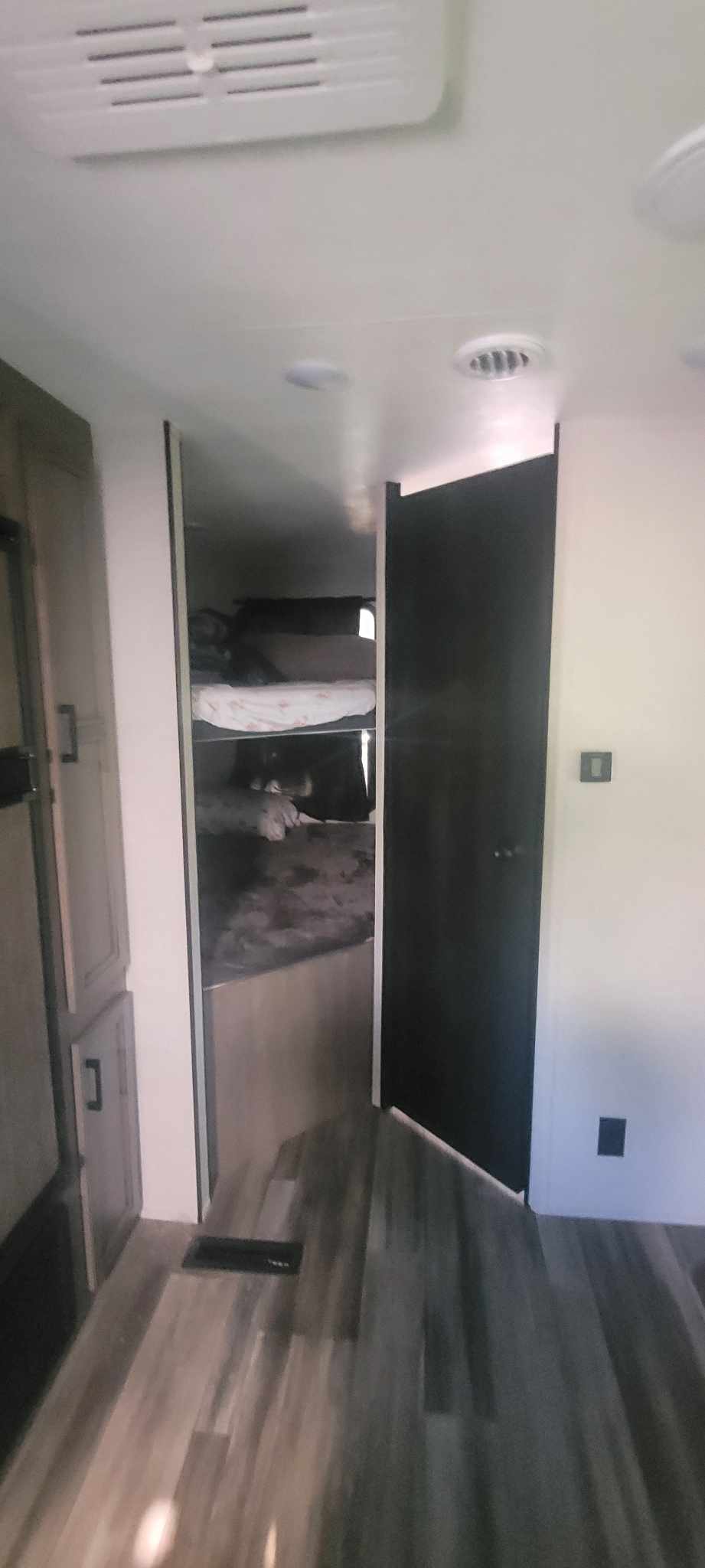 RV rental interior featuring a cozy bunk bed area, sleek flooring, and modern amenities.. Starcraft Autumn Ridge 2022