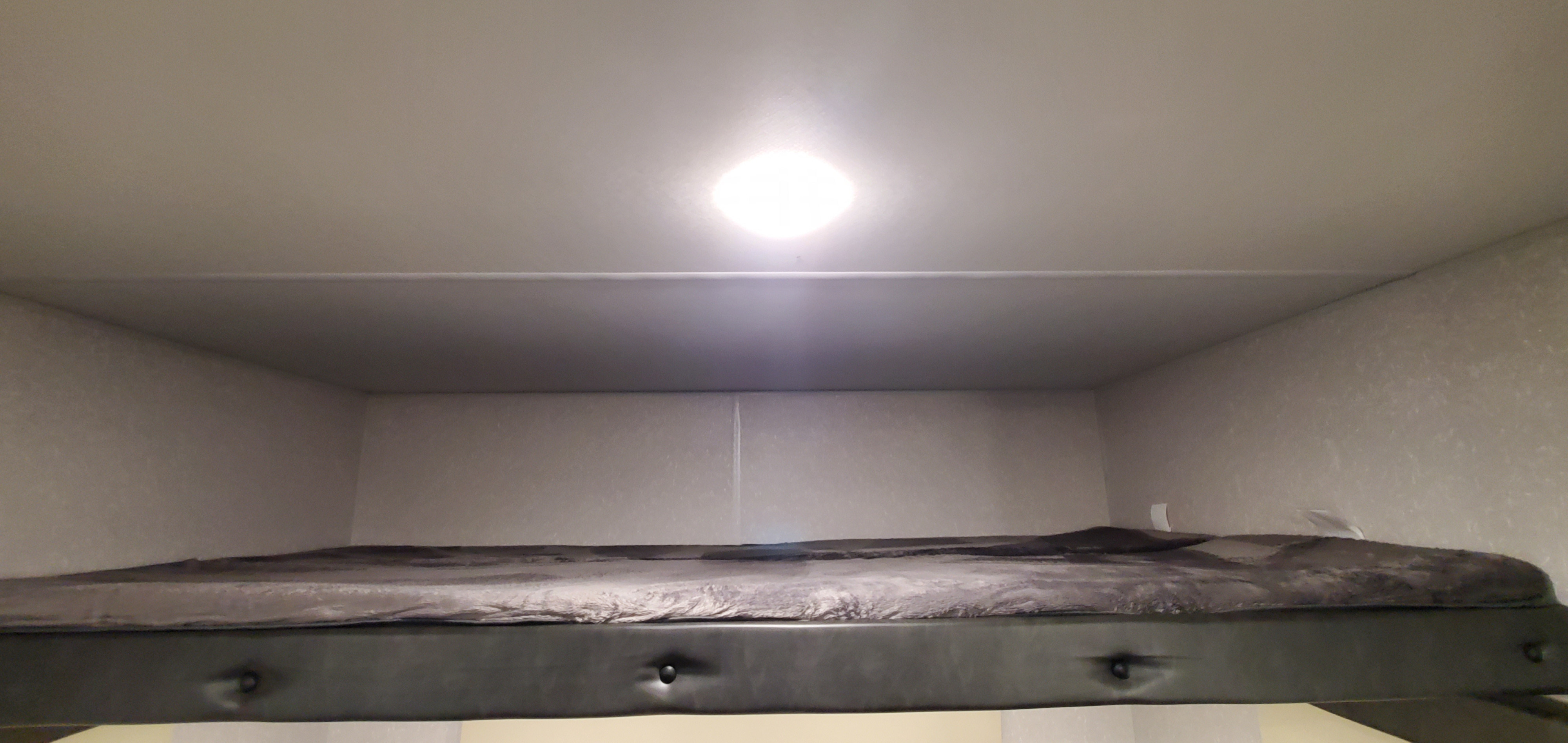 Overhead full size bunk bed.. Forest River Cherokee Grey Wolf Fish House 2022