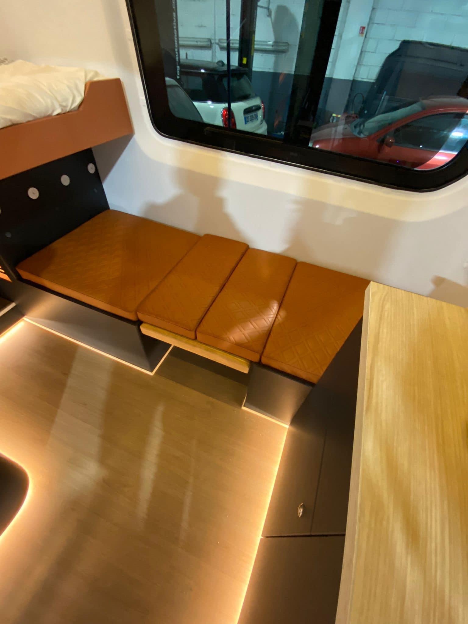 Experience comfort in this RV rental! Interior features a bunk bed, versatile seating, and sleek lighted floor.. Mercedes sprinter 2018