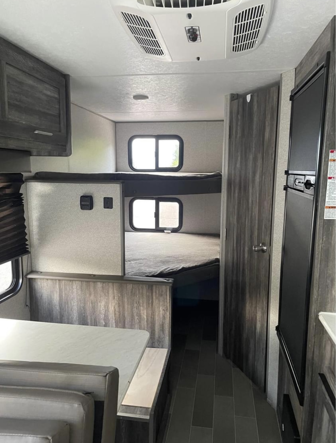 Double-over-double bunk beds in the back of the trailer.. Forest River Salem FSX 2020