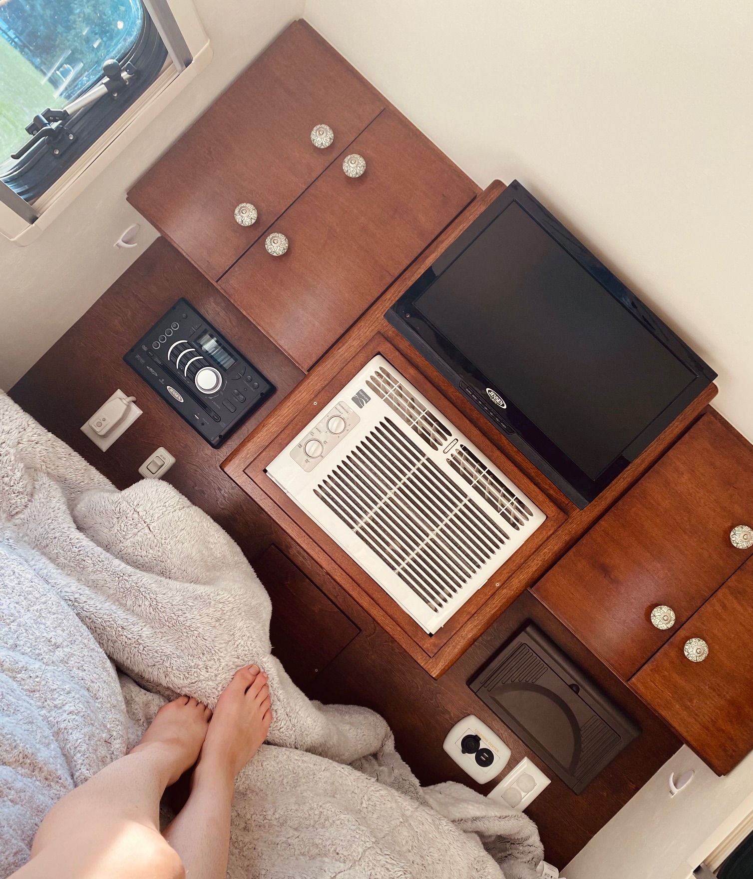 RV rental: Cozy overhead view of a bedroom with built-in wood, AC, TV, & stereo. Ideal for travel comfort.. Little Guy T@G Little Guy T@G Trailer 2016