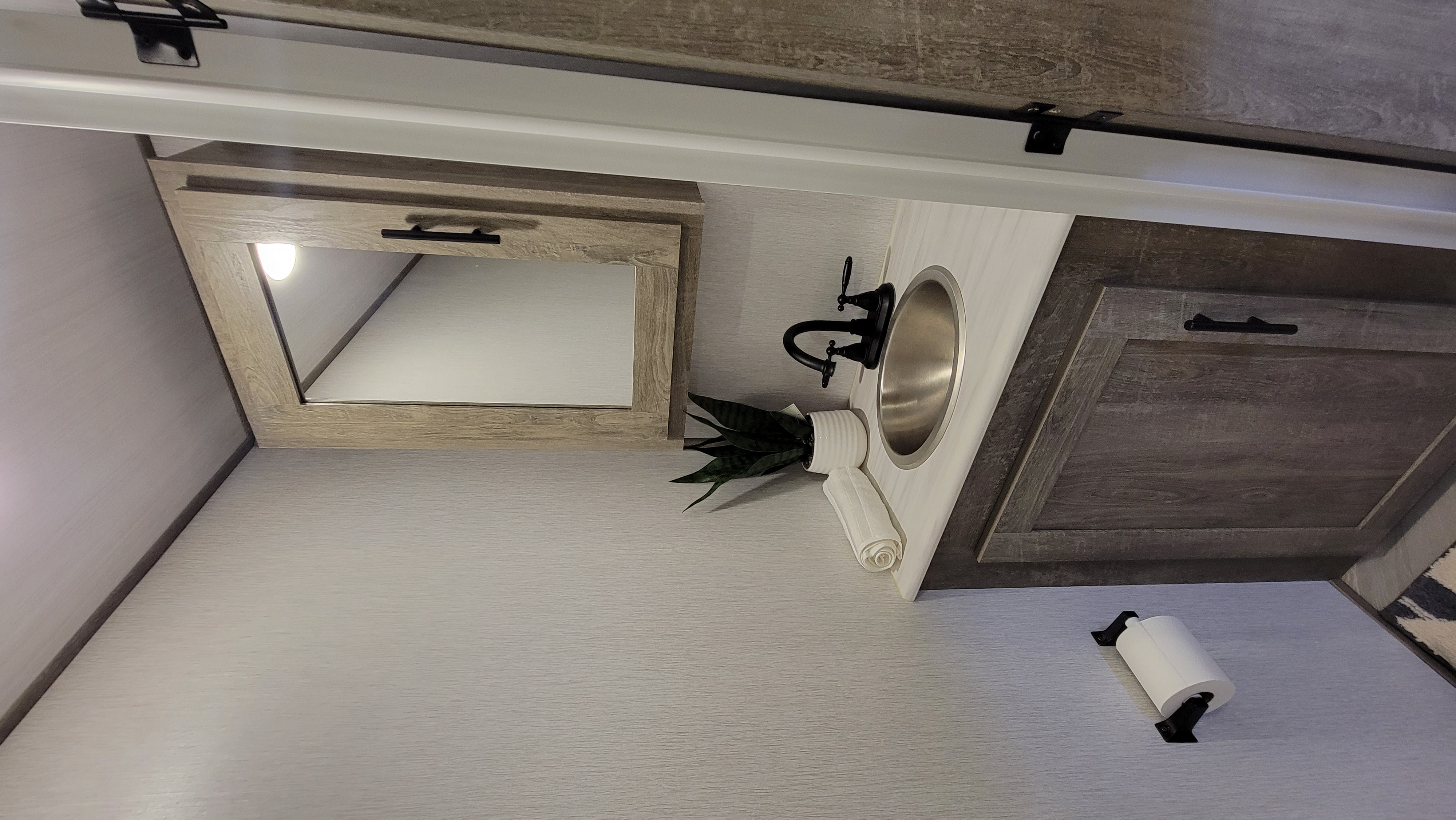 1/2 a bathroom in kitchen for your guest. Forest River Wildwood Heritage Glen 2022