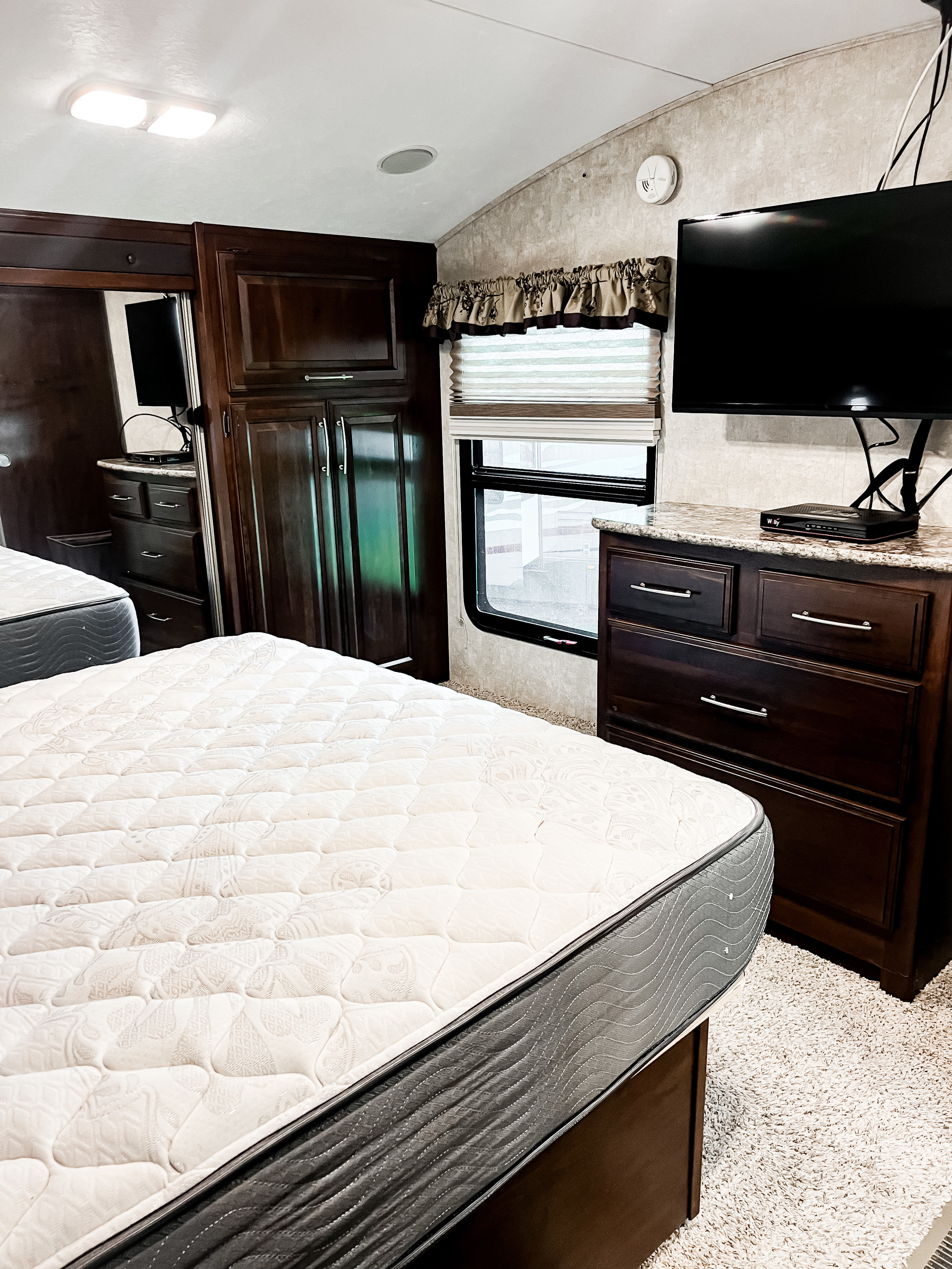Flat screen tv on the wall in the bedroom as well. Keystone RV Cougar 2015