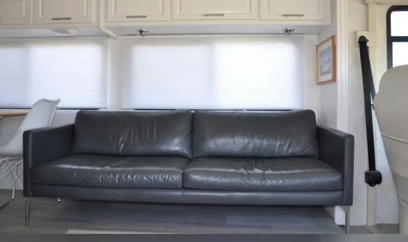 My oldest son usually sleeps on the couch. When her pullout is out, then we put an air mattress next to sofa and my youngest sleeps there. . Itasca Sunova 2004