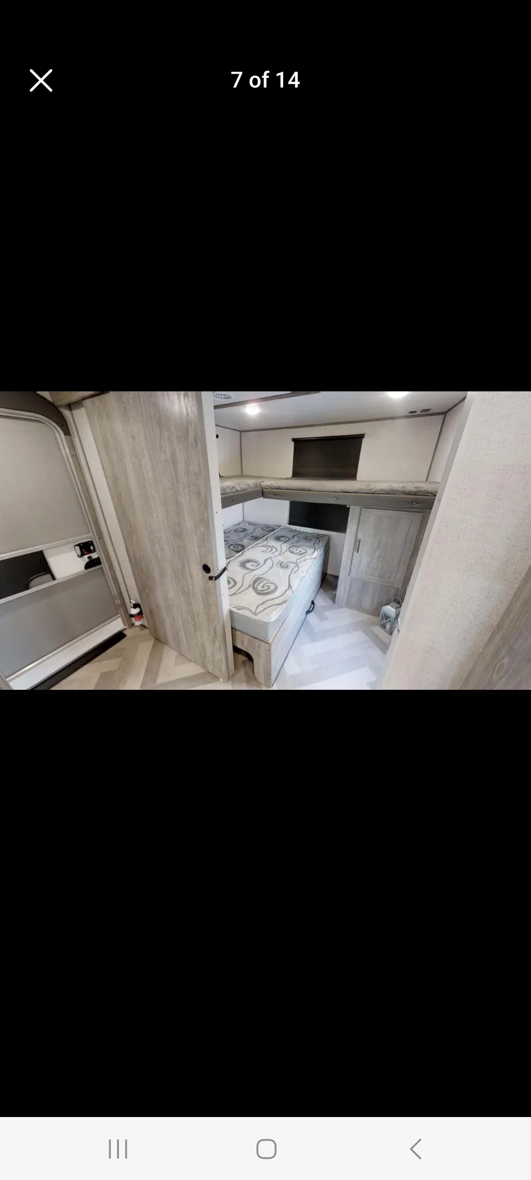 Rear bedroom with queen bed and 2 bunks.. Forest River Salem Hemisphere HL 2021