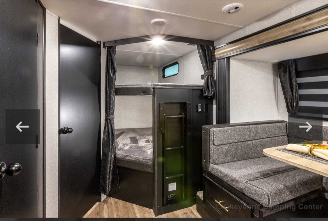 Great bunk beds for kids or adults, with plenty of space and equipped with a tucked in ladder. Top and bottom bunk have a window!. Forest River Cherokee Grey Wolf 2022