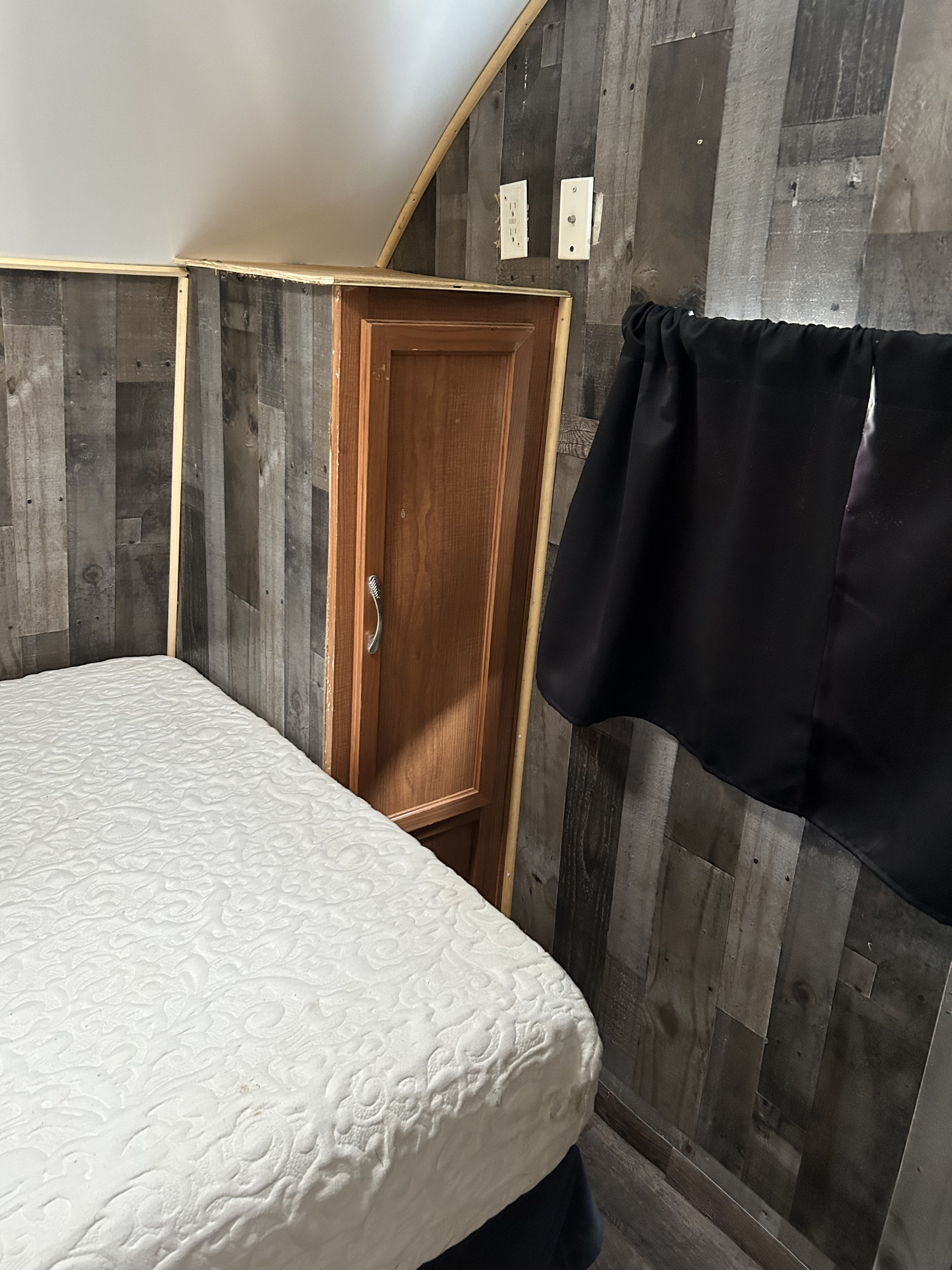 Master bedroom with 12” memory foam mattress with 19” tv dvd combo and storage closet and blackout curtains. . Coachmen Spirit of America 2005