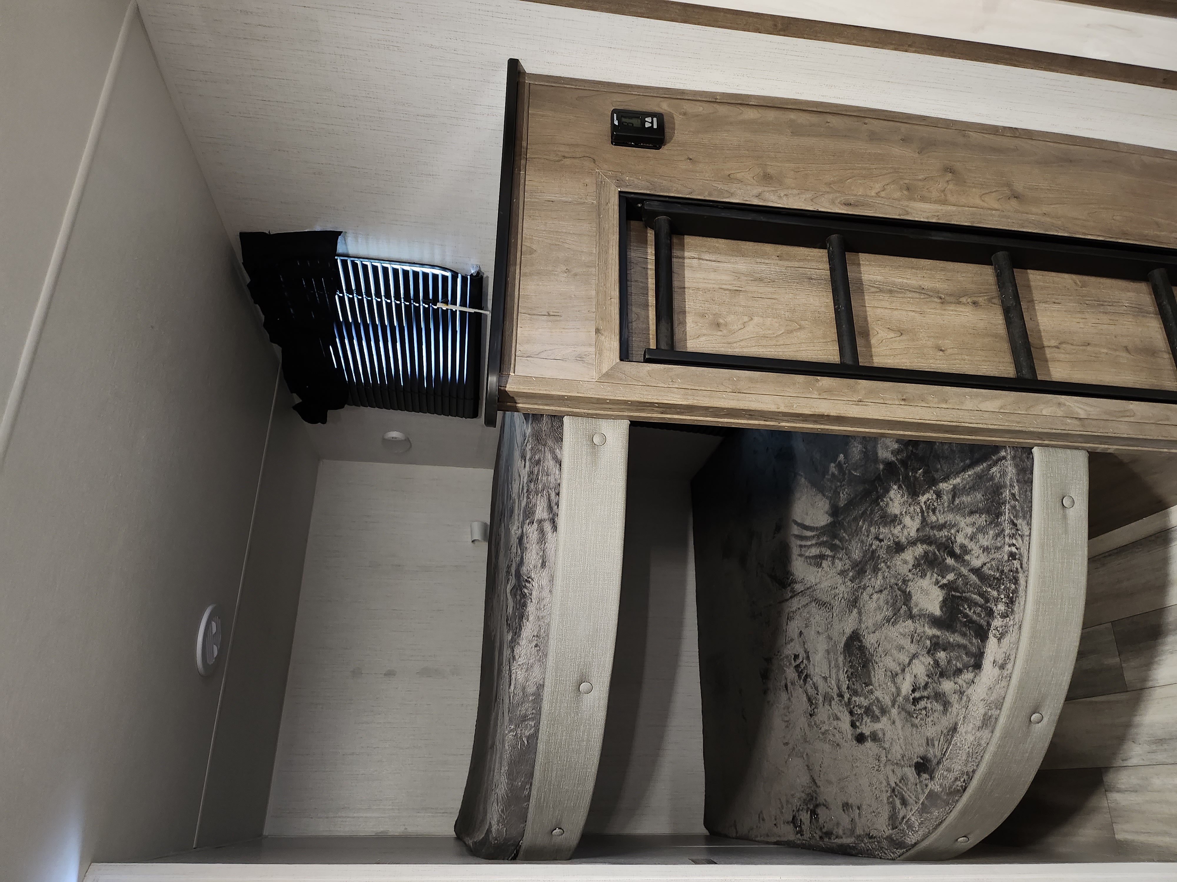 RV rental: Bunk bed with ladder above convertible dinette seating. Features a digital control panel & vent.. HEARTLAND PIONEER BH270 2024