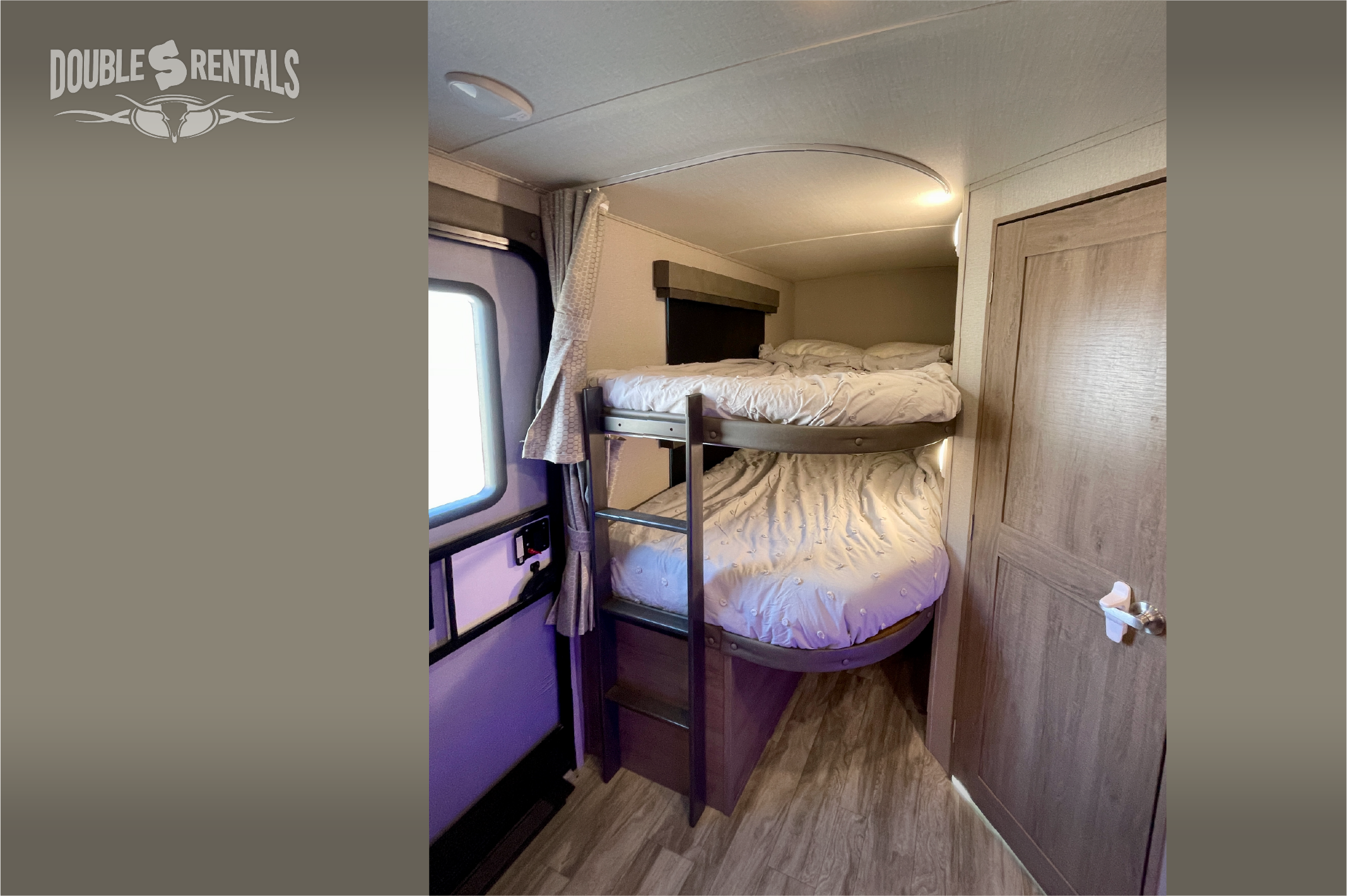 Bunk beds inside an RV rental. Cozy sleeping area, perfect for travel trailer adventures.. Grand Design Imagine 2021