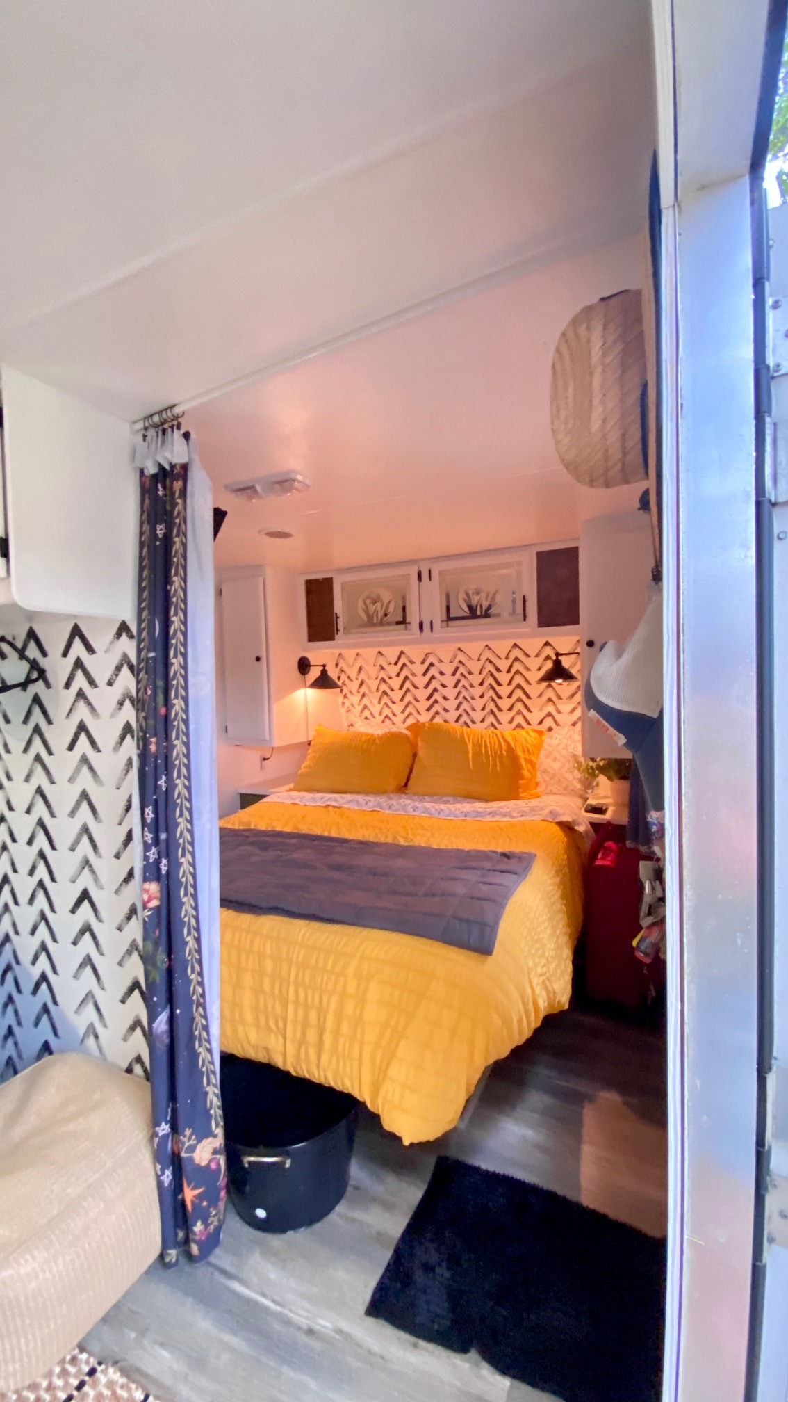 Queen bedroom with 10" memory foam mattress, large underbed storage area, Dual reading lights, Double closets.  TV mounted to opposite wall. . Coachmen Prowler 2003