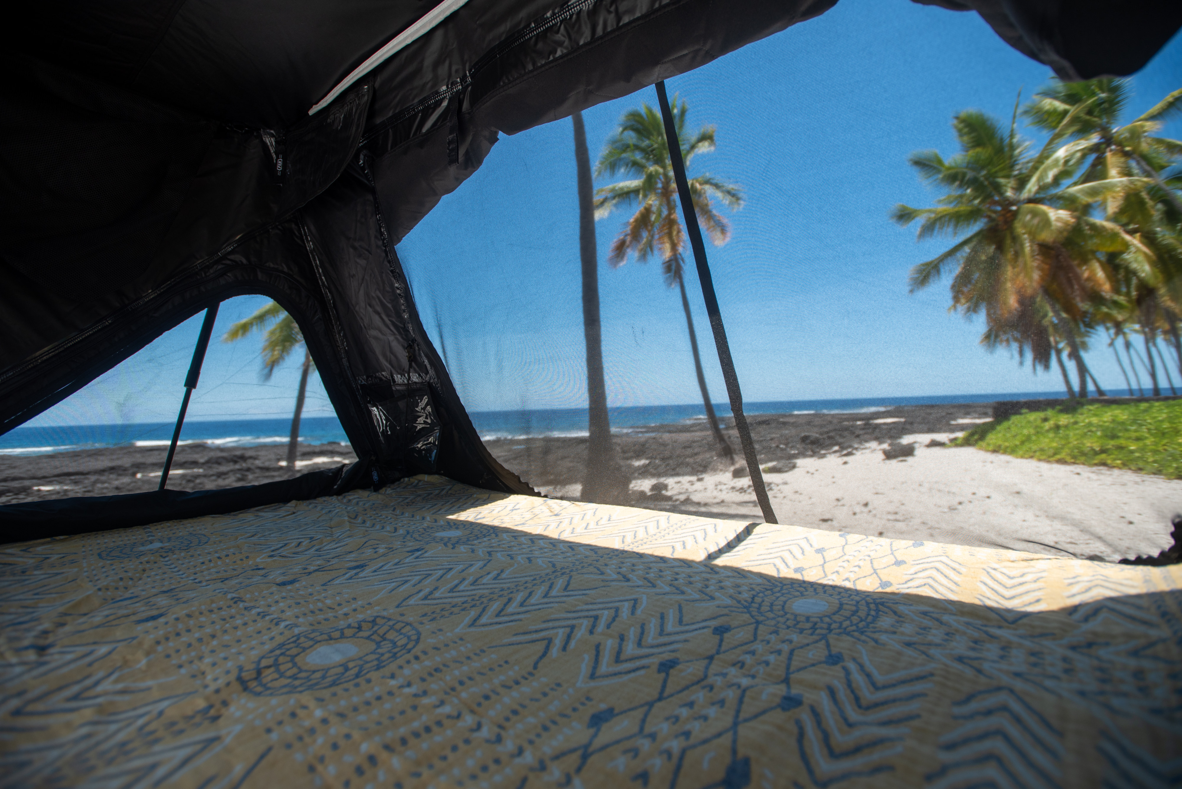 Experience beachfront bliss with our RV rental! Relax in a comfortable rooftop tent with stunning ocean and palm tree views.. Custom Toyota 4Runner TRD Off-Road 2023