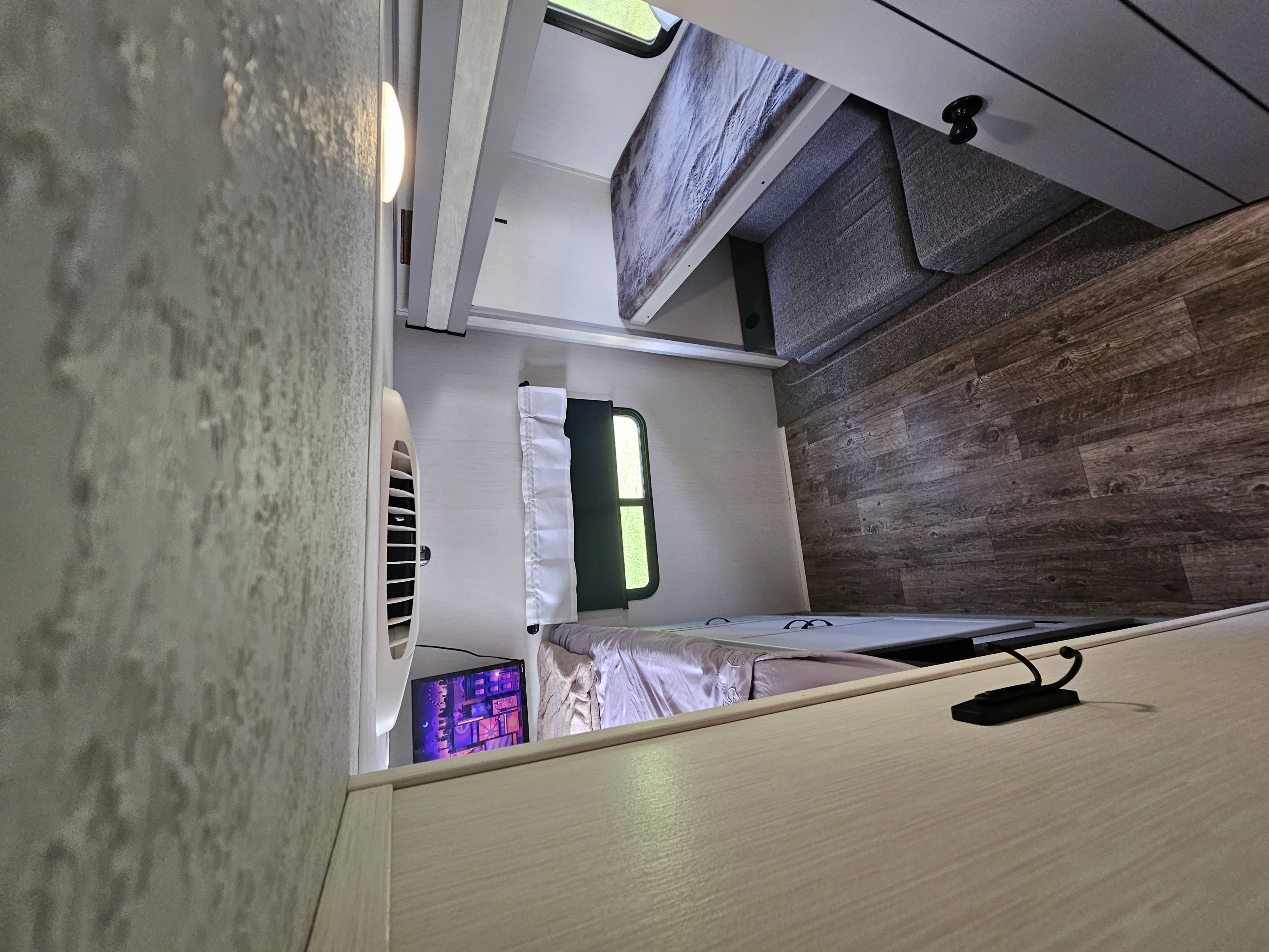 Bunkroom can sleep 3 comfortably. 
Room can convert into a lounge w/ TV on pivoting arm for viewing ease. Great room for the kids! (Big and Small!). Forest River Vibe 2022