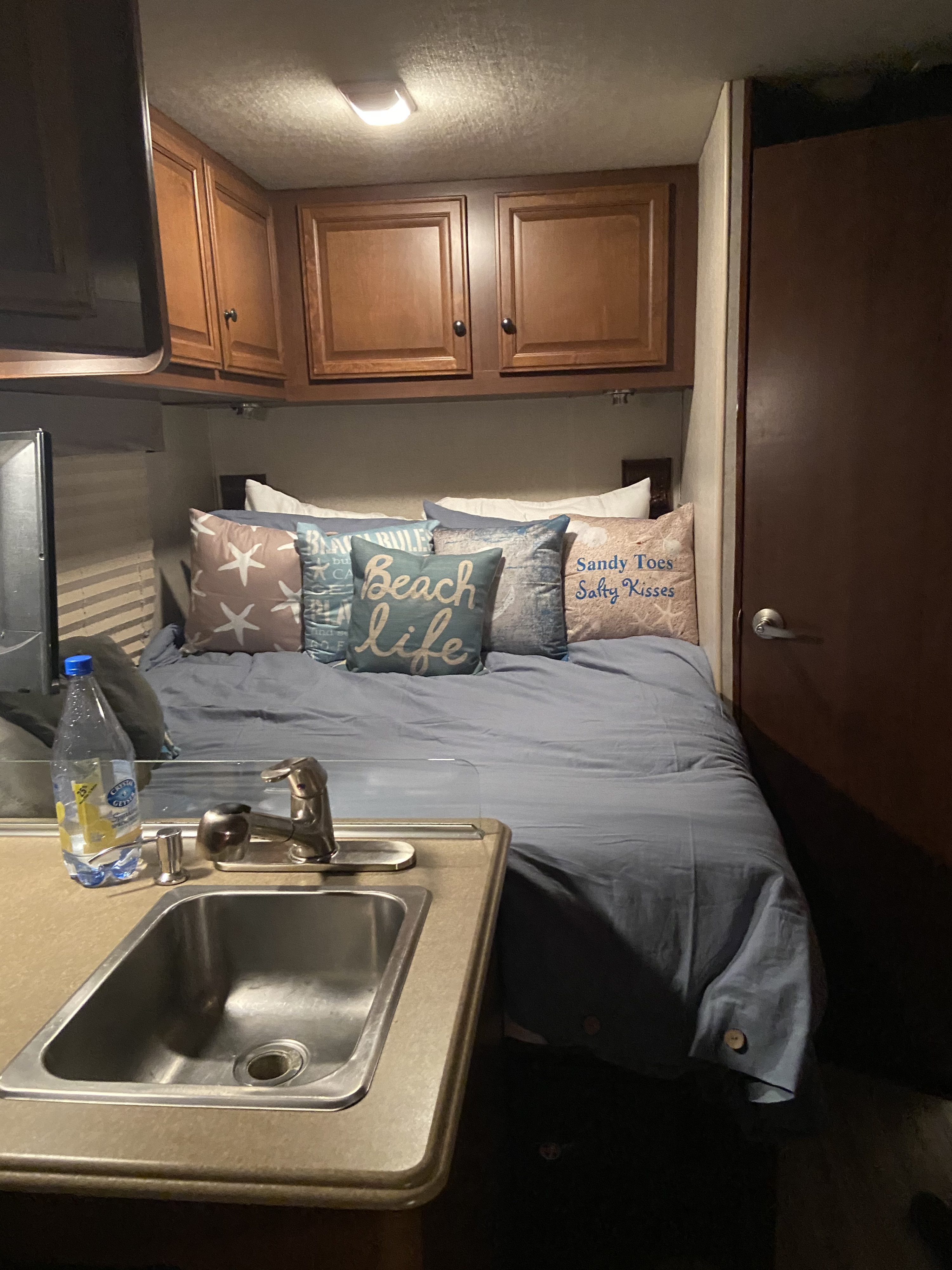 Close up of main bed in the rear of the RV.. Tioga Montara 2013