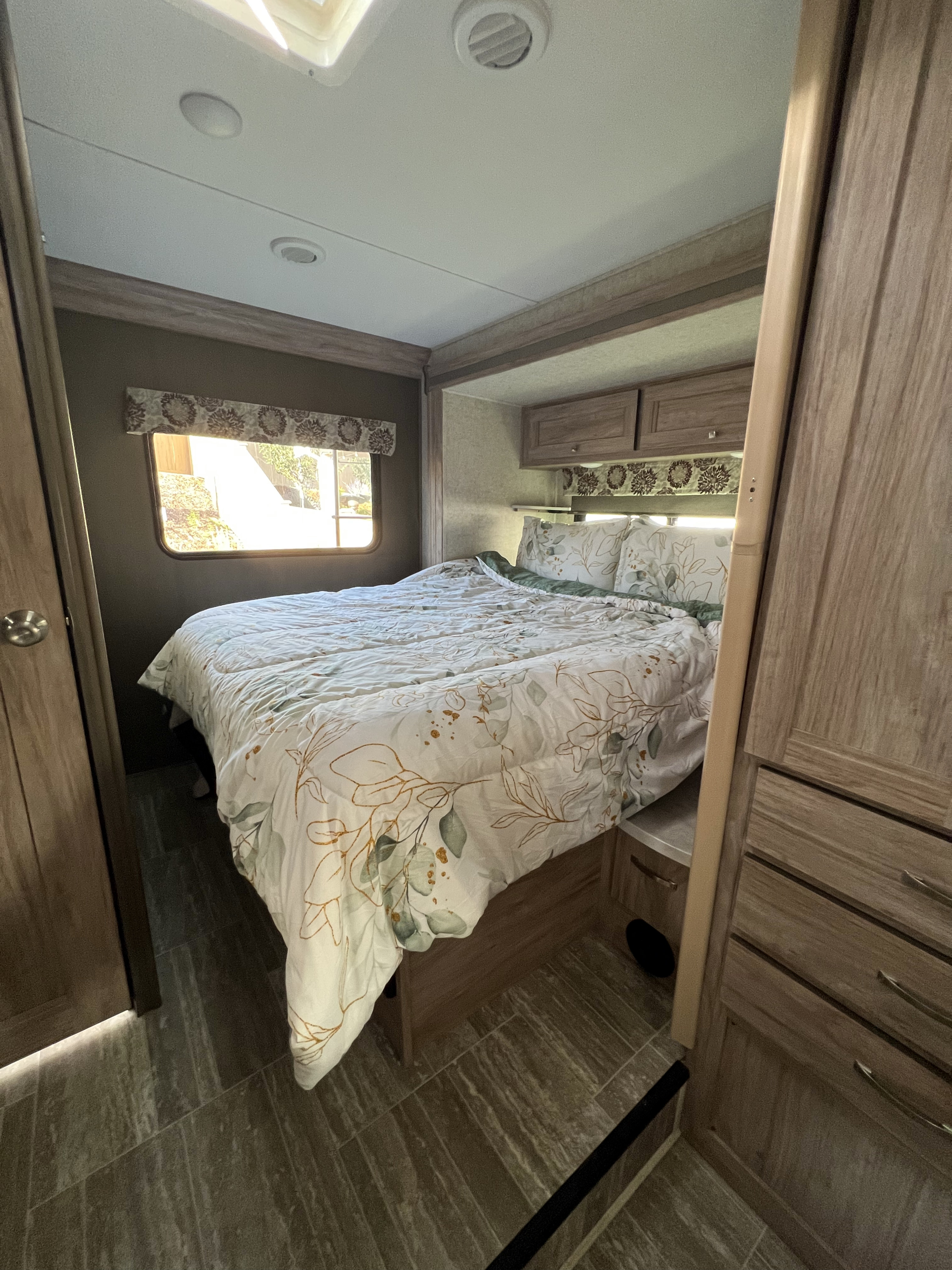 Main bedroom with an expandable wall to provide privacy.. Forester LE 2020