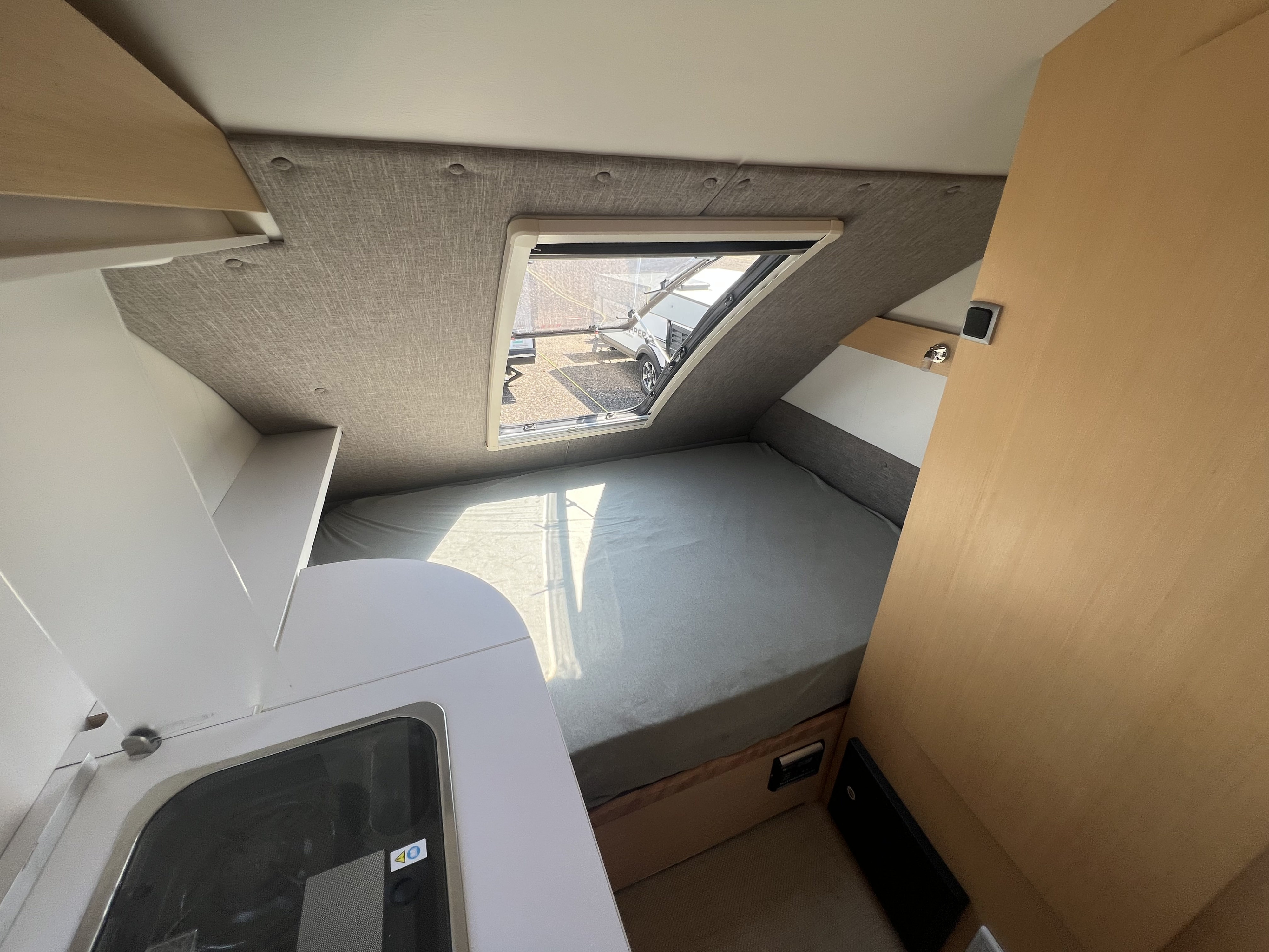 queen bed and stargazer window. nuCamp T@B 2019