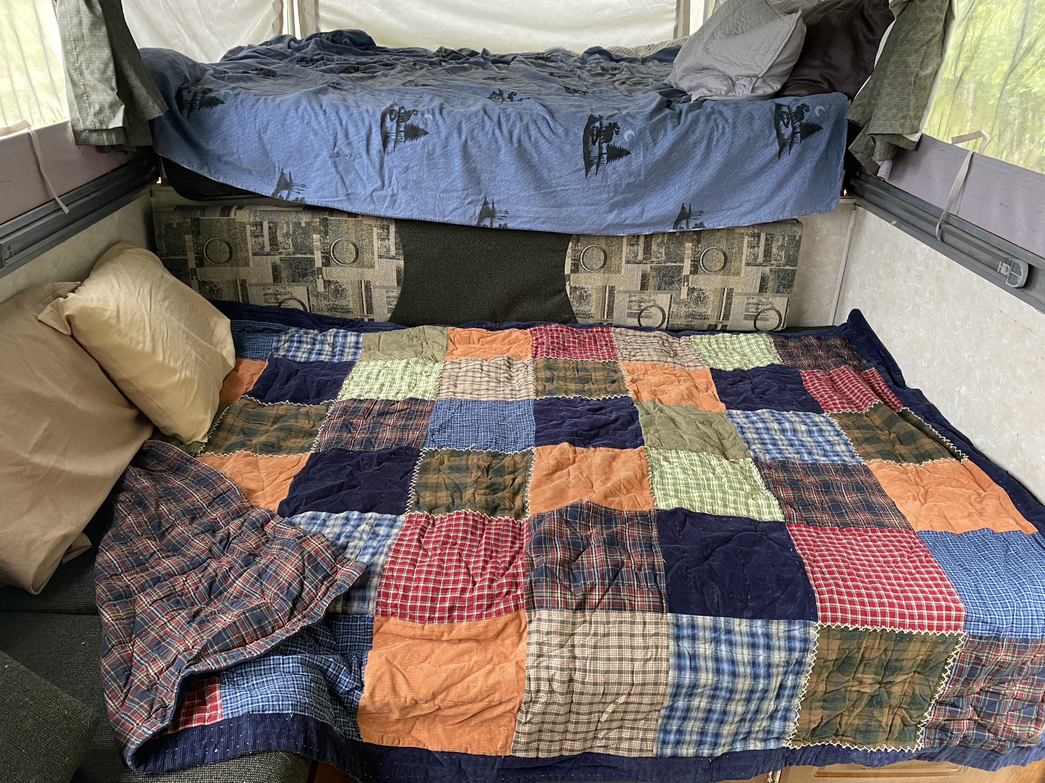 King size bed for 2 adults or a few kiddos...dinette folds into a bed for a kid or too, also!. Forest River sequoia pop up camper 2000