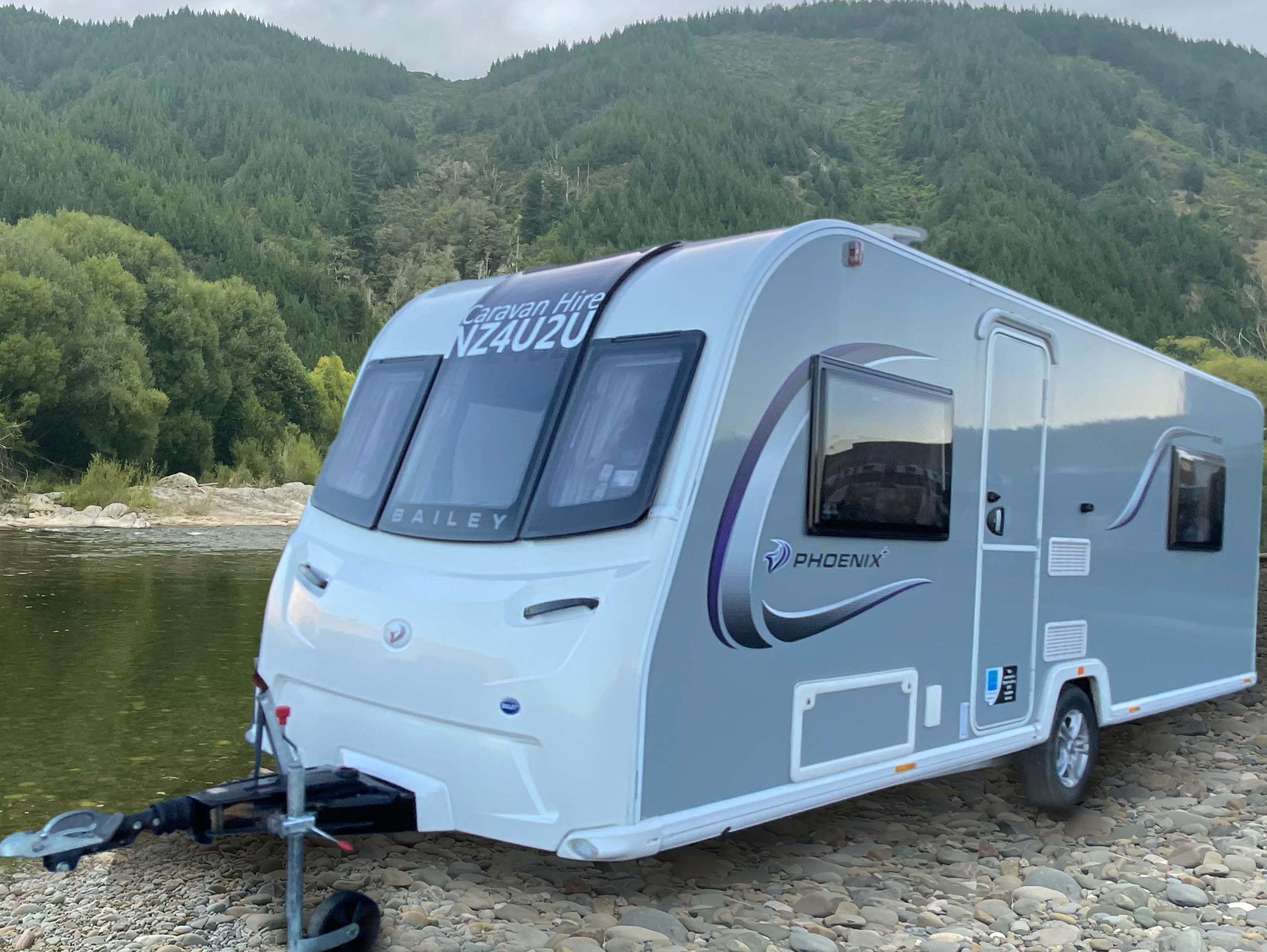 4 berth with a fixed island double bed and lounge that coverts to 2 beds