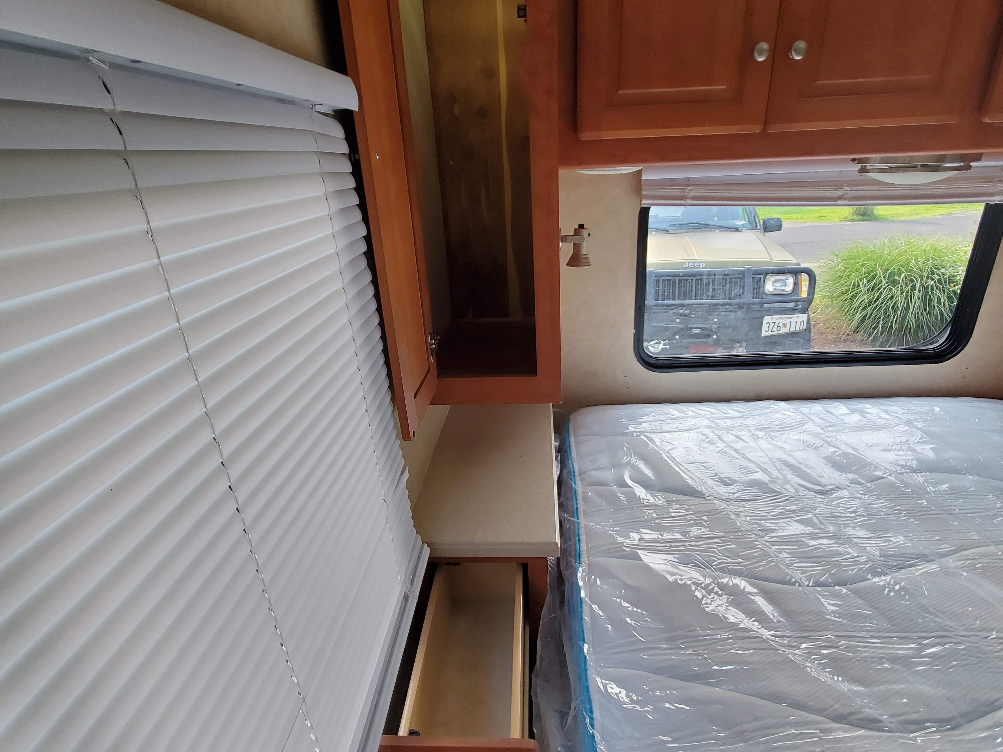 Leave your clothes on the hangers, tons of handing storage on both sides of the bed.. Forester Forester Motorhome 2007