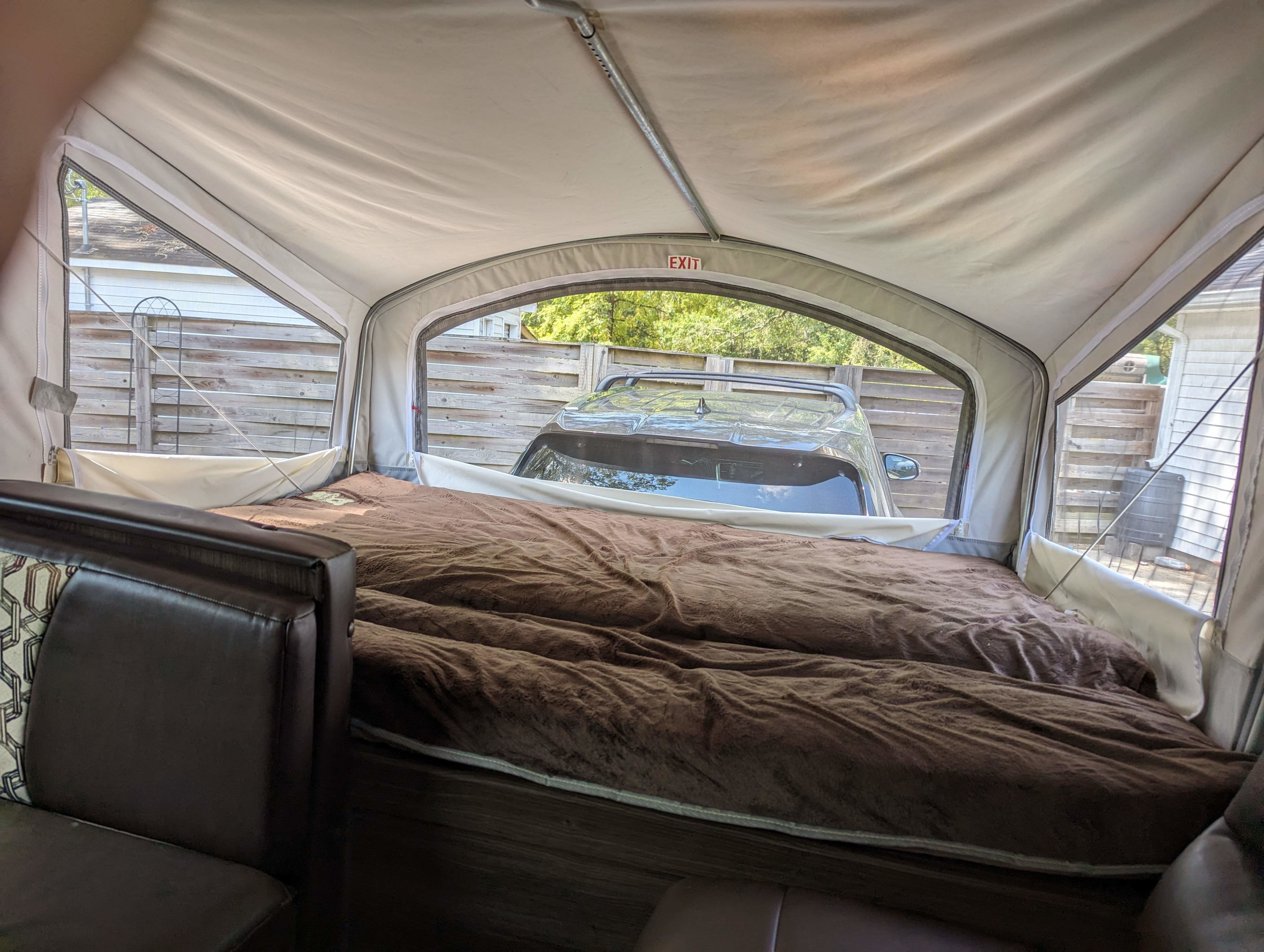 Other pop-out extended with the double curtain pulled out of the way and the blinds unzipped.. Keystone RV Bullet Crossfire 2018