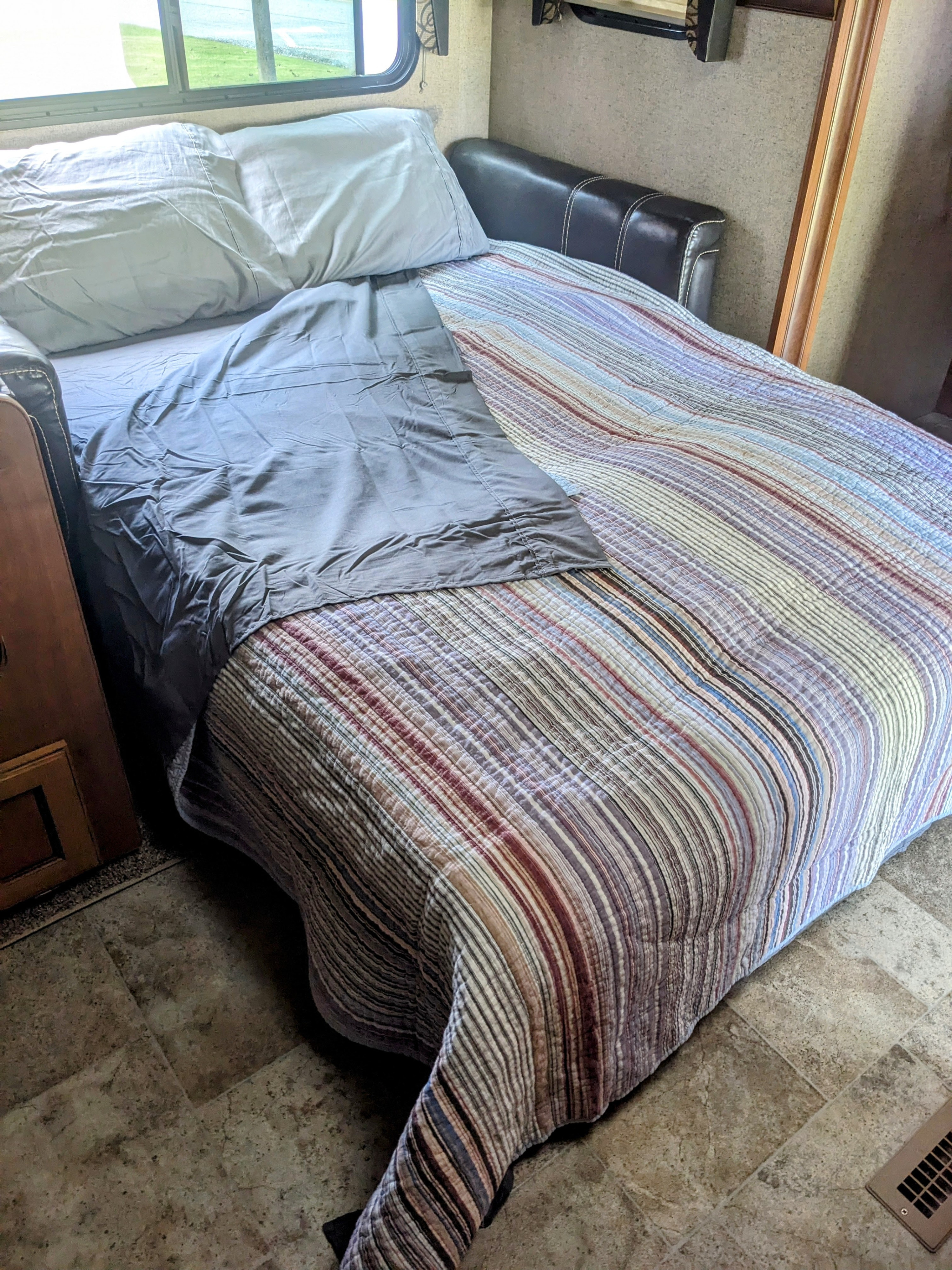 Sofa converts to a full bed.  . Crossroads RV Sunset Trail Super Lite 2017