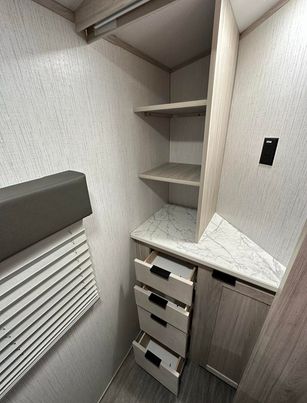 This is the little hidden storage space behind the sliding door in the bedroom!.. Cruiser RV Shadow Cruiser 2022