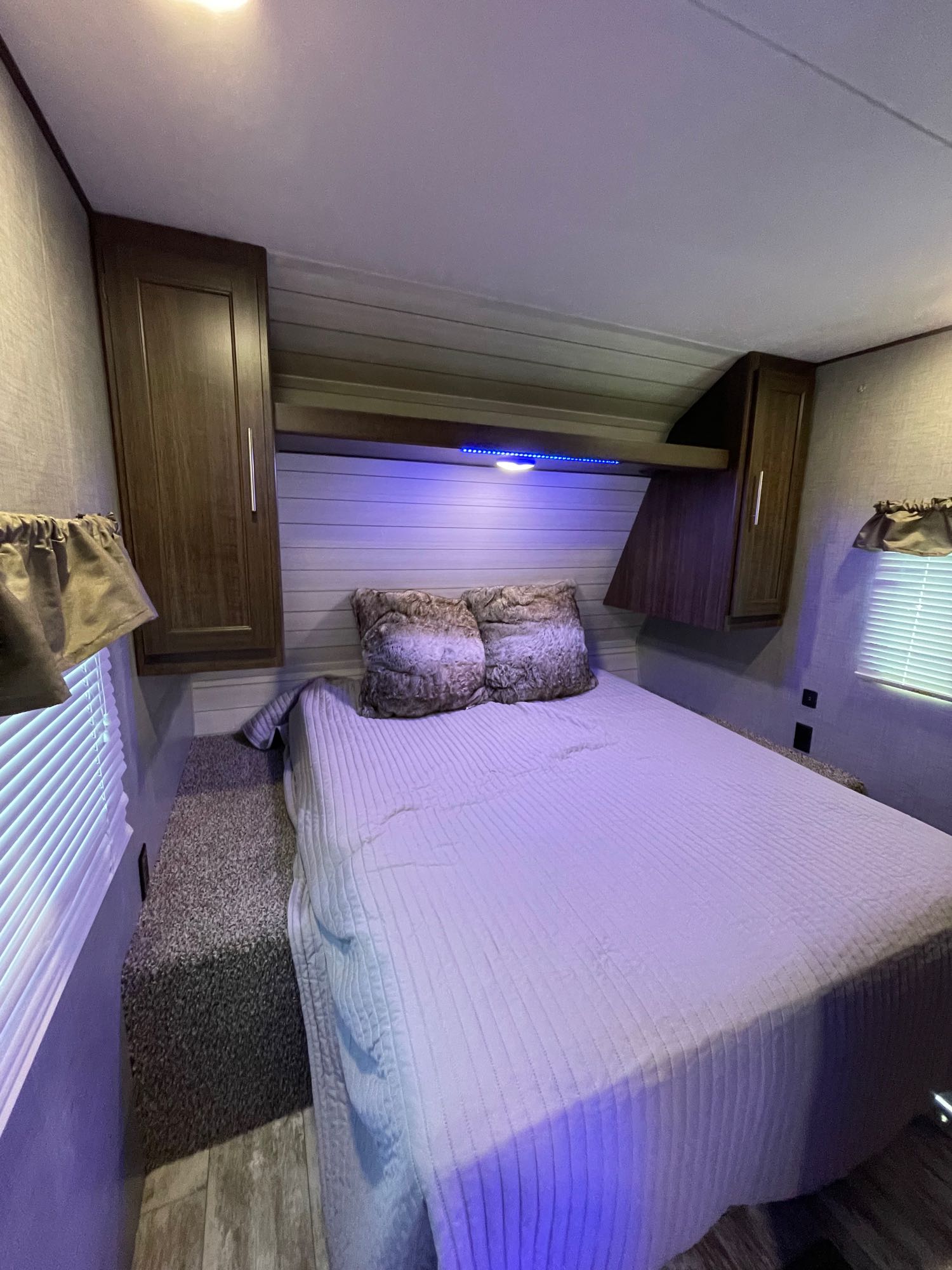 Master bedroom with a sliding door to separate. . CrossRoads Recreational Vehicles ZR280BH 2018