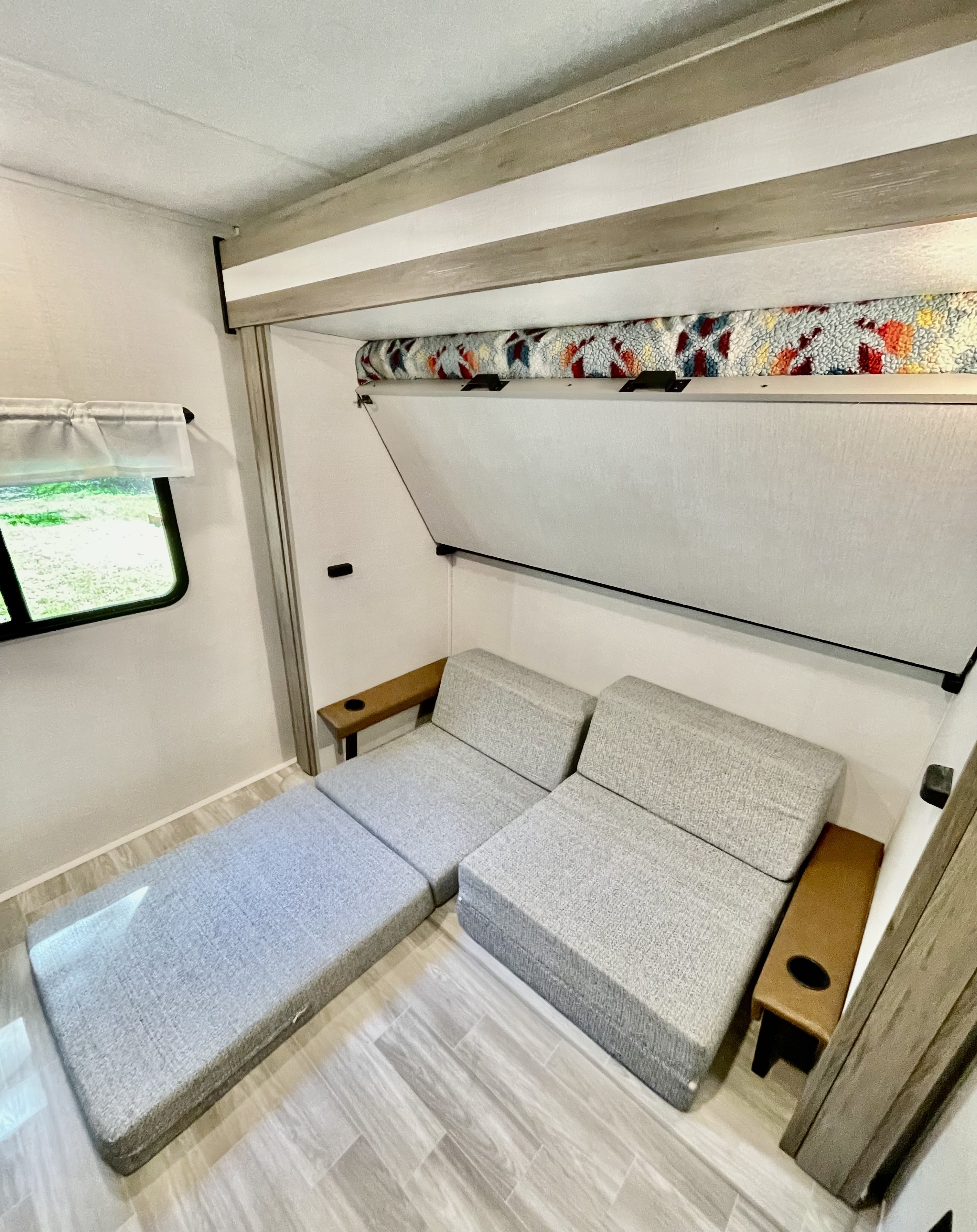 Bunk folds up - fold out couch. Forest River Vibe 34Bh 2024