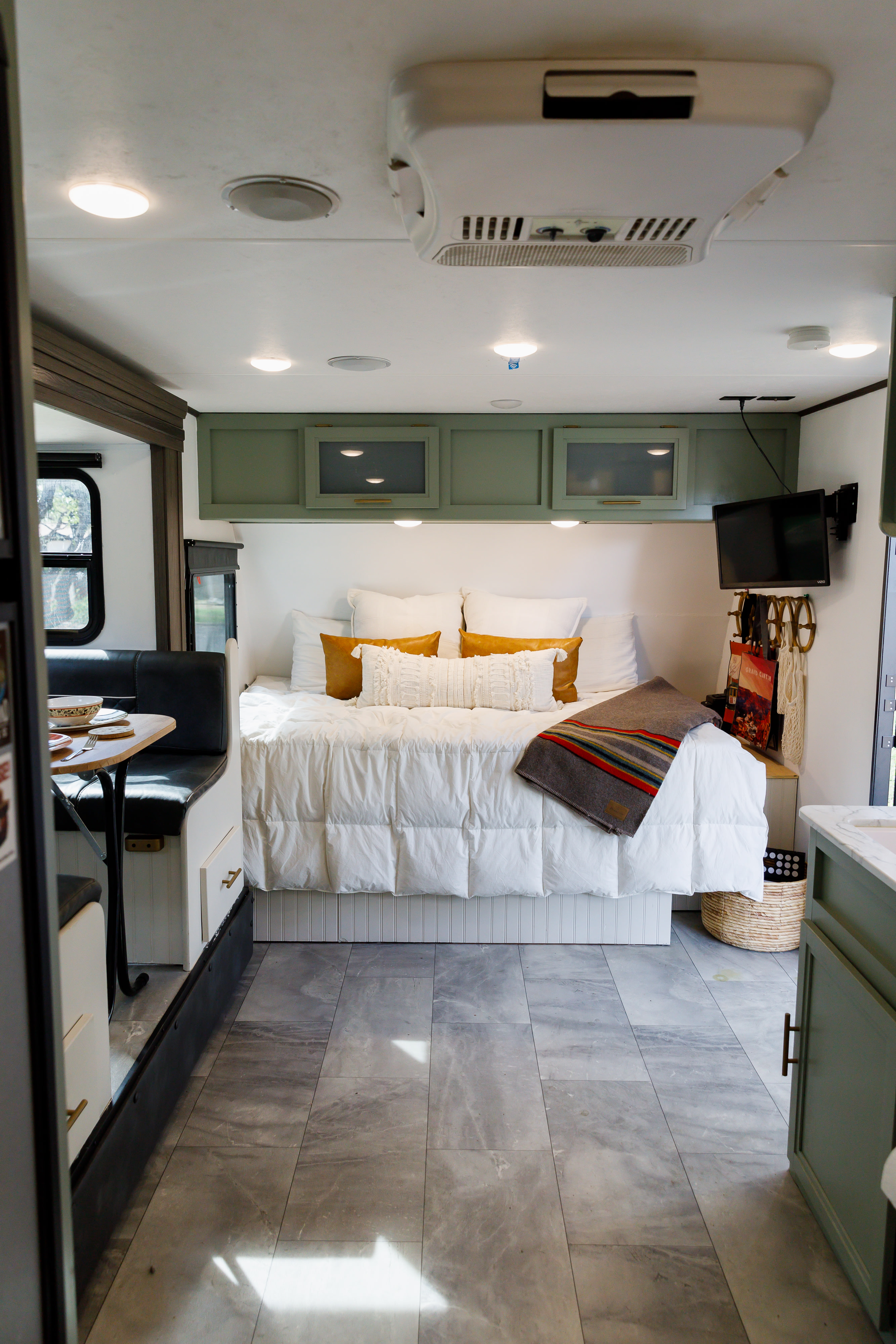 BRAND NEW Queen mattress with 2” foam topper for ultimate relaxation . Dutchmen Kodiak Cub 2021