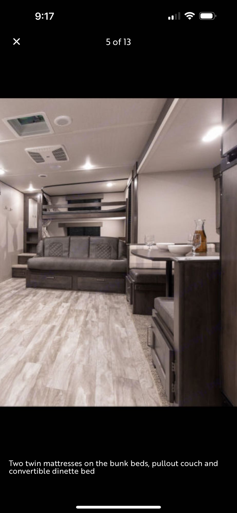 This RV rental offers twin bunk beds, a pullout couch, and a convertible dinette bed, maximizing sleeping space.. Grand Design Transcend Xplor 2021